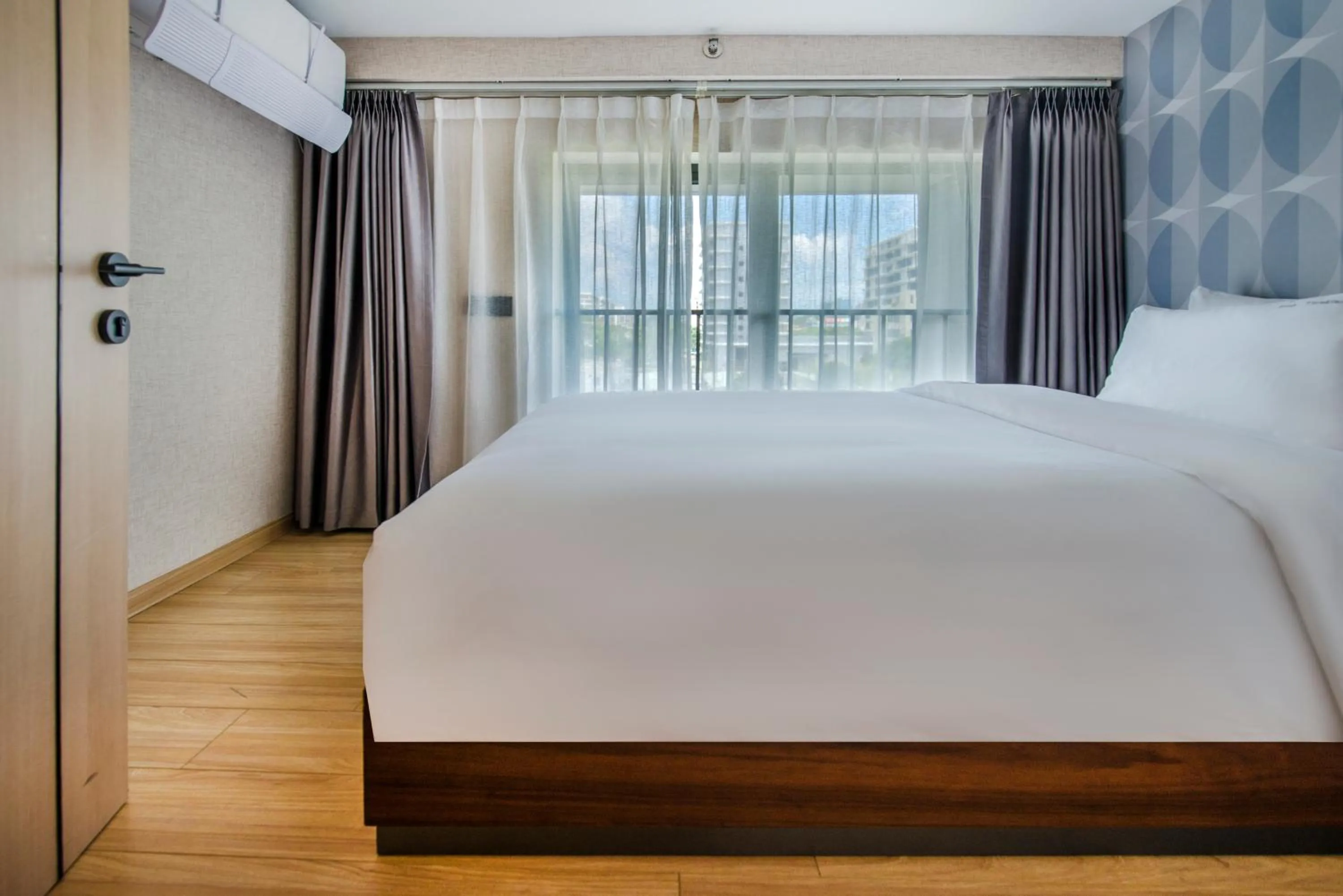 Bed in Baytop Living of Guangzhou Drimin House Hotel - Canton Fair Free Shuttle Bus