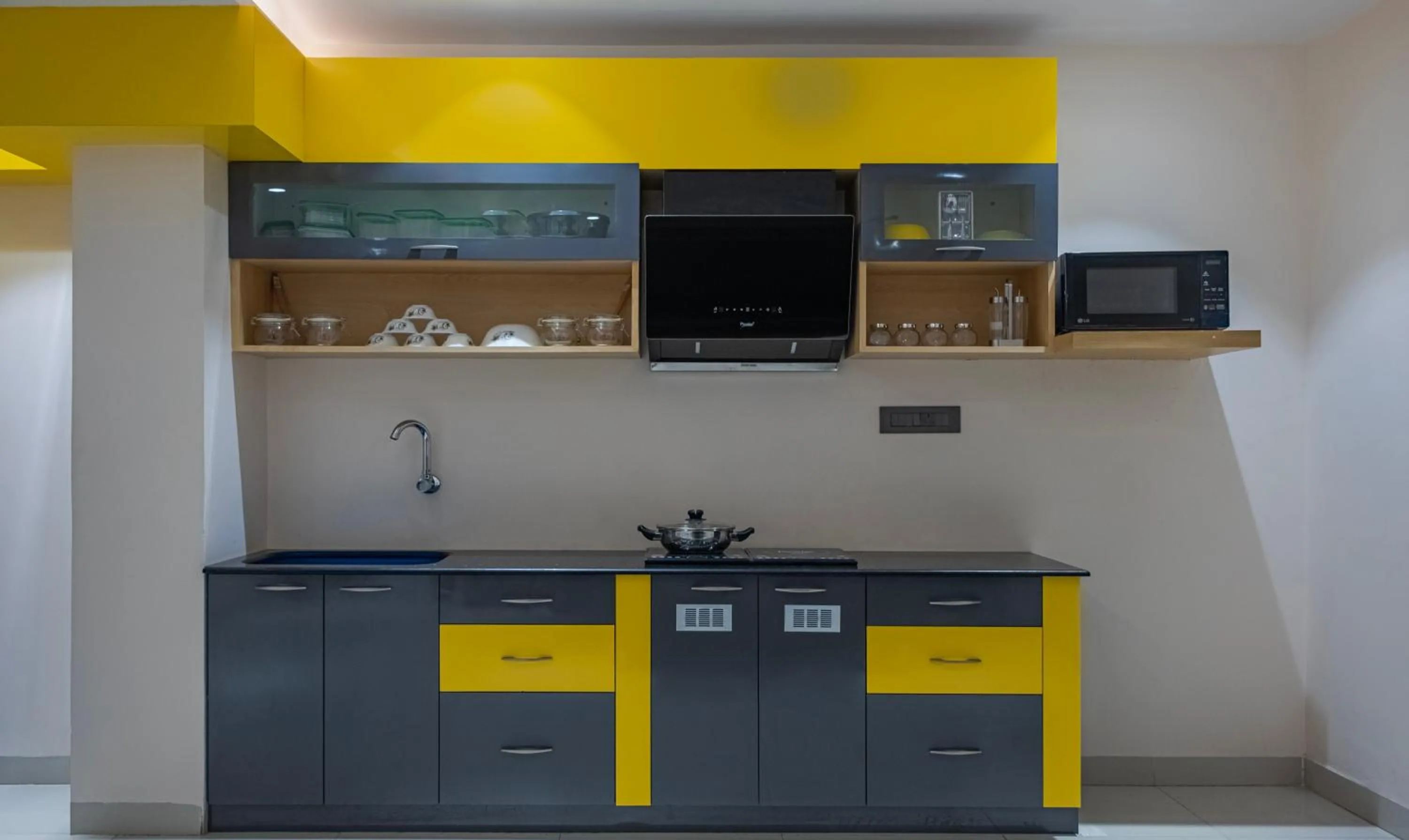 kitchen in Treebo Su Casa Grand