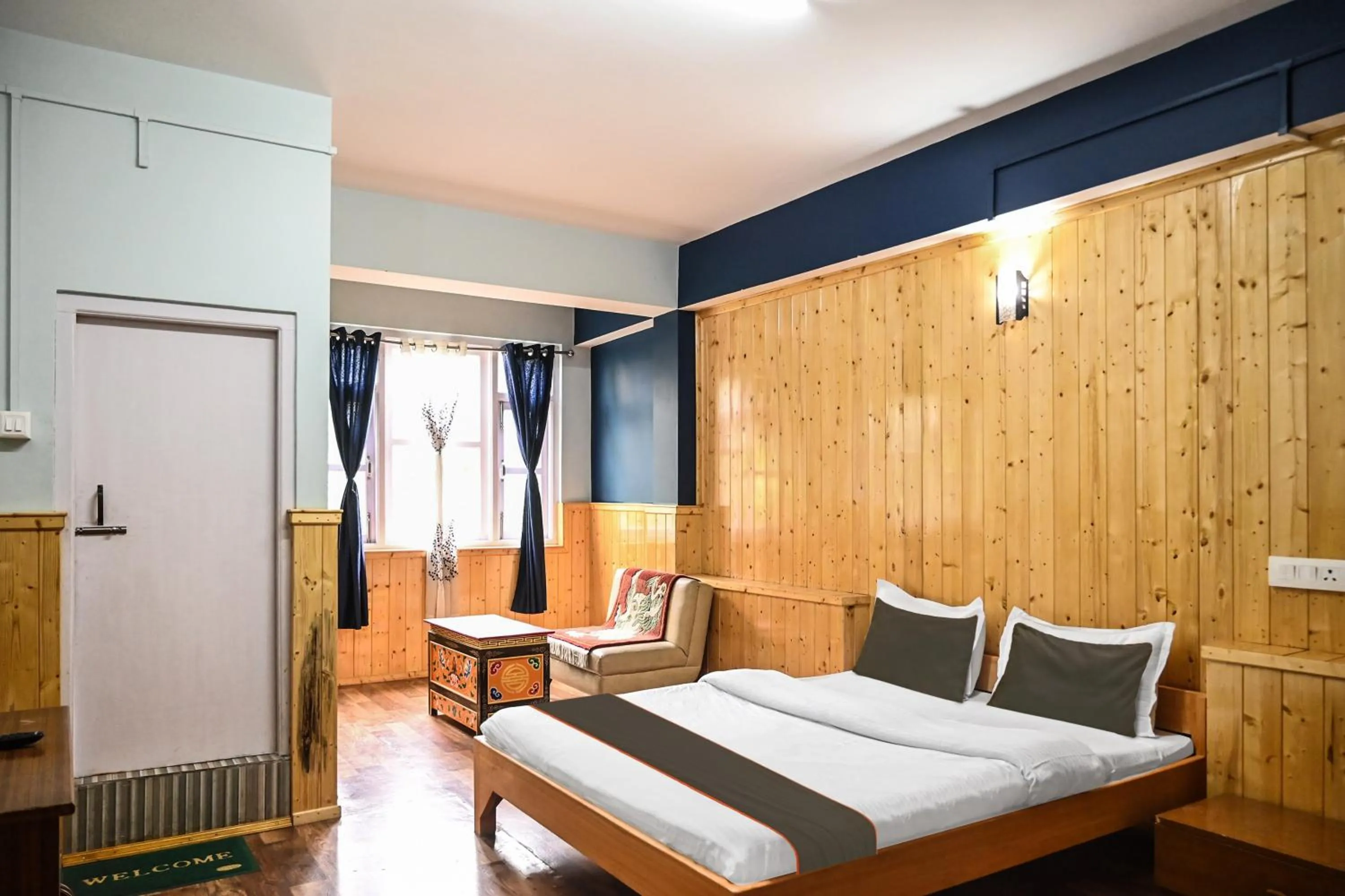 Bedroom in Hotel O Kaizen Residency