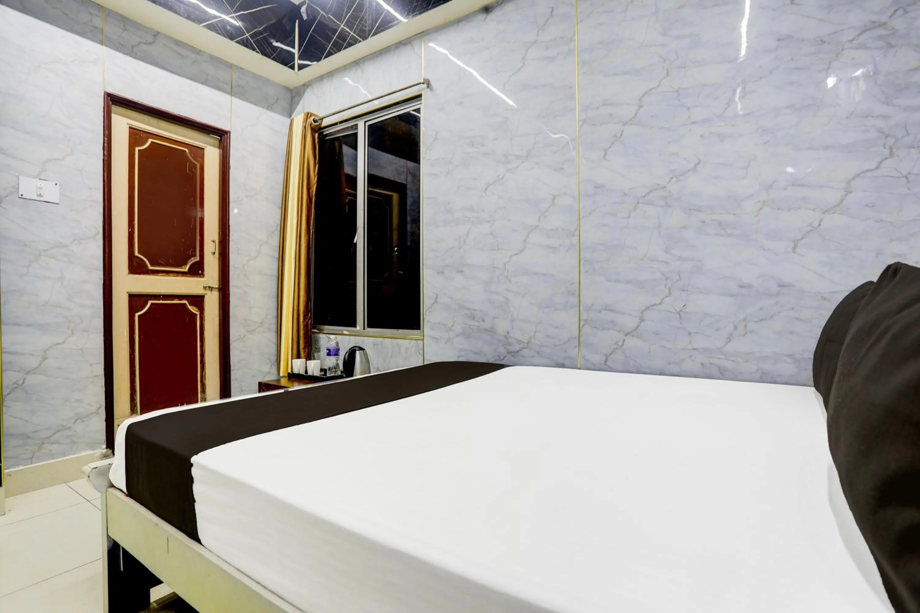 Bedroom in Spot On Sri Balaji