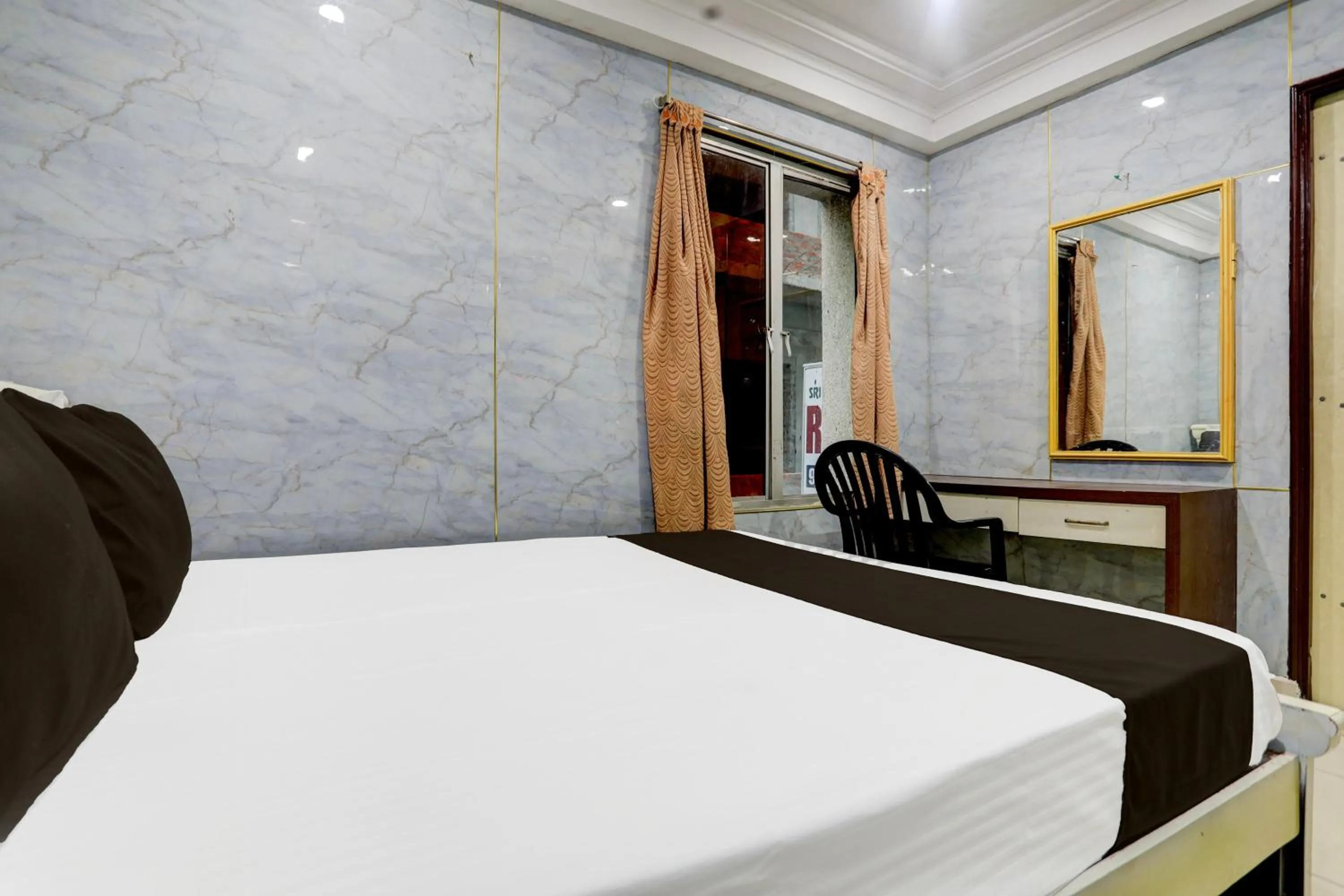 Bedroom in Spot On Sri Balaji