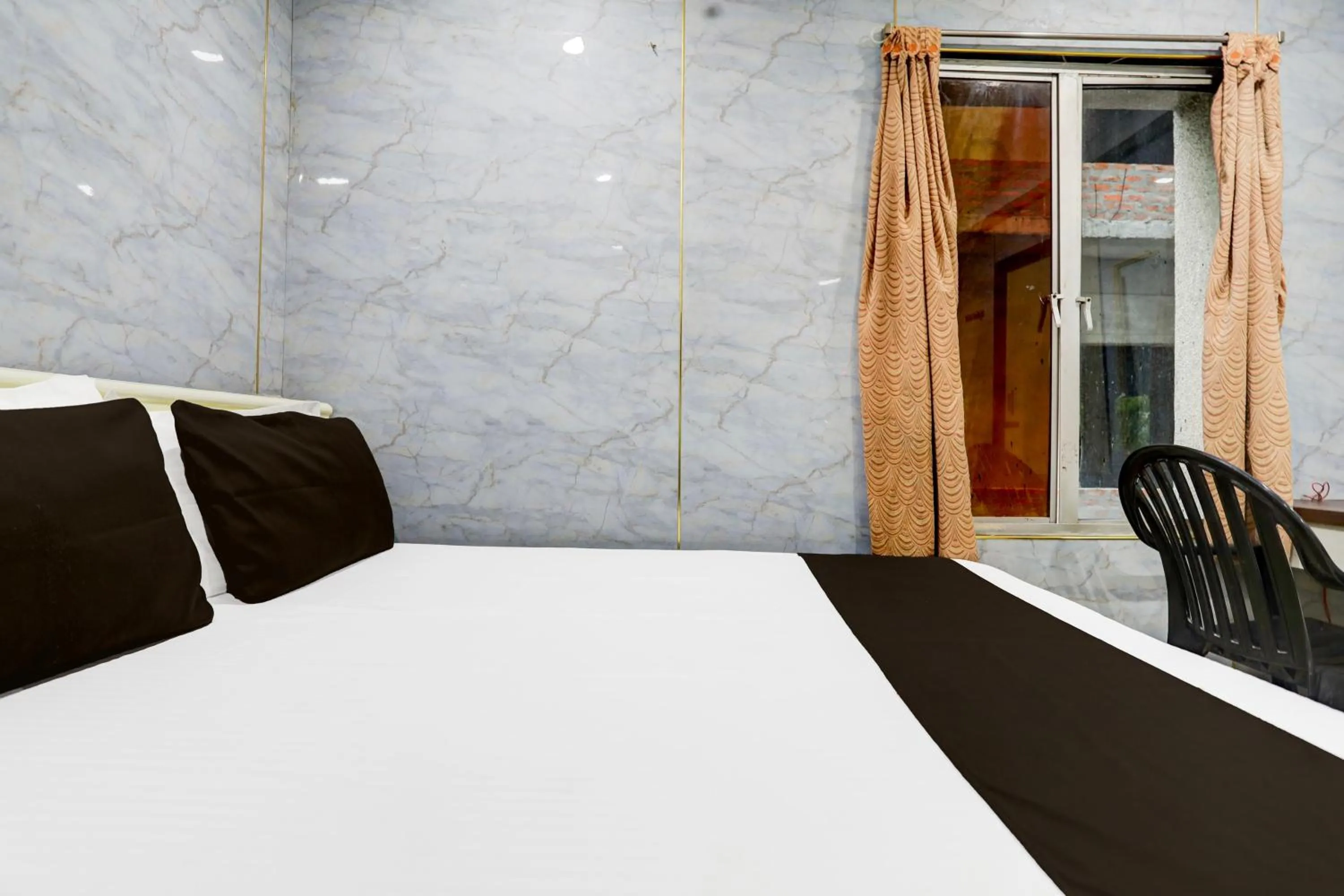 Bedroom in Spot On Sri Balaji