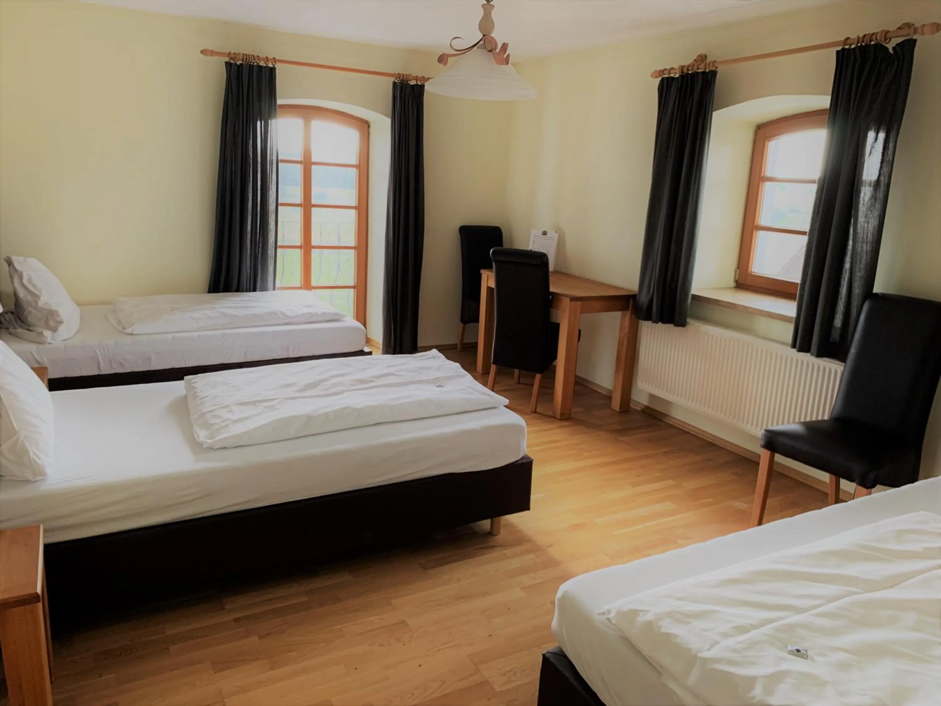 Photo of the whole room, Bed in Hotel Stanglbräu