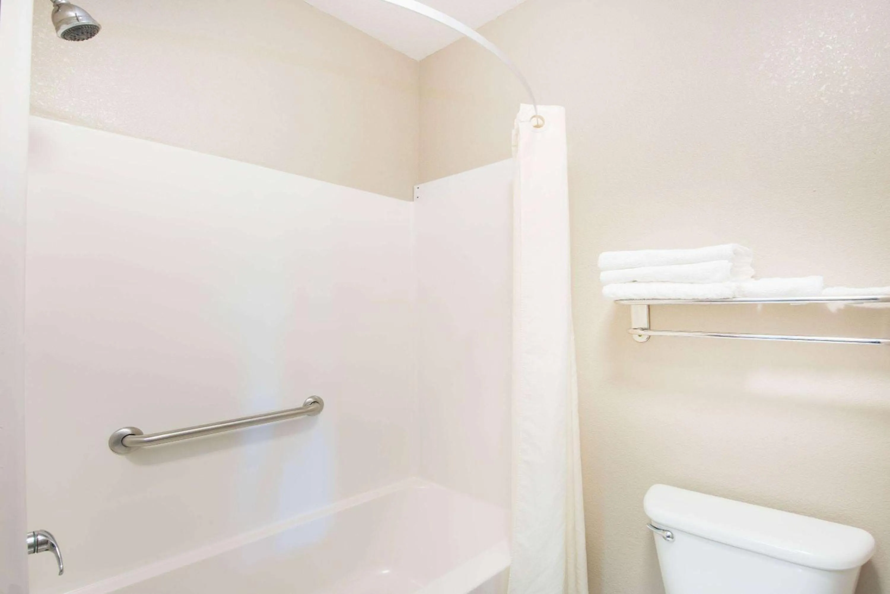 Bathroom in Super 8 by Wyndham Iola KS