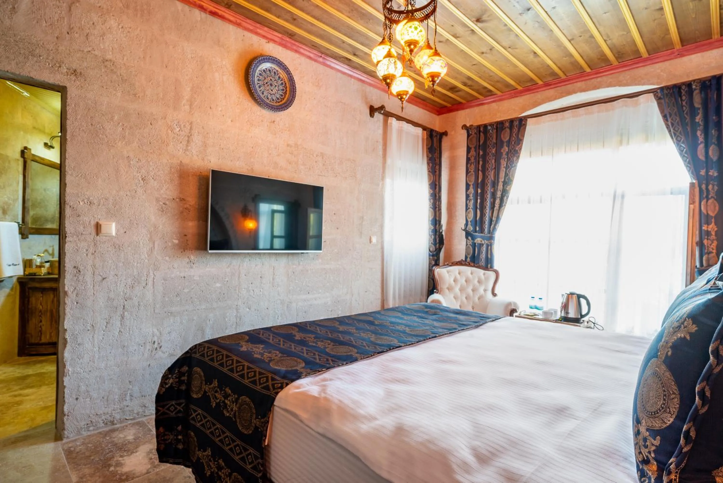 Bed in CAPPANAR CAVE HOTEL