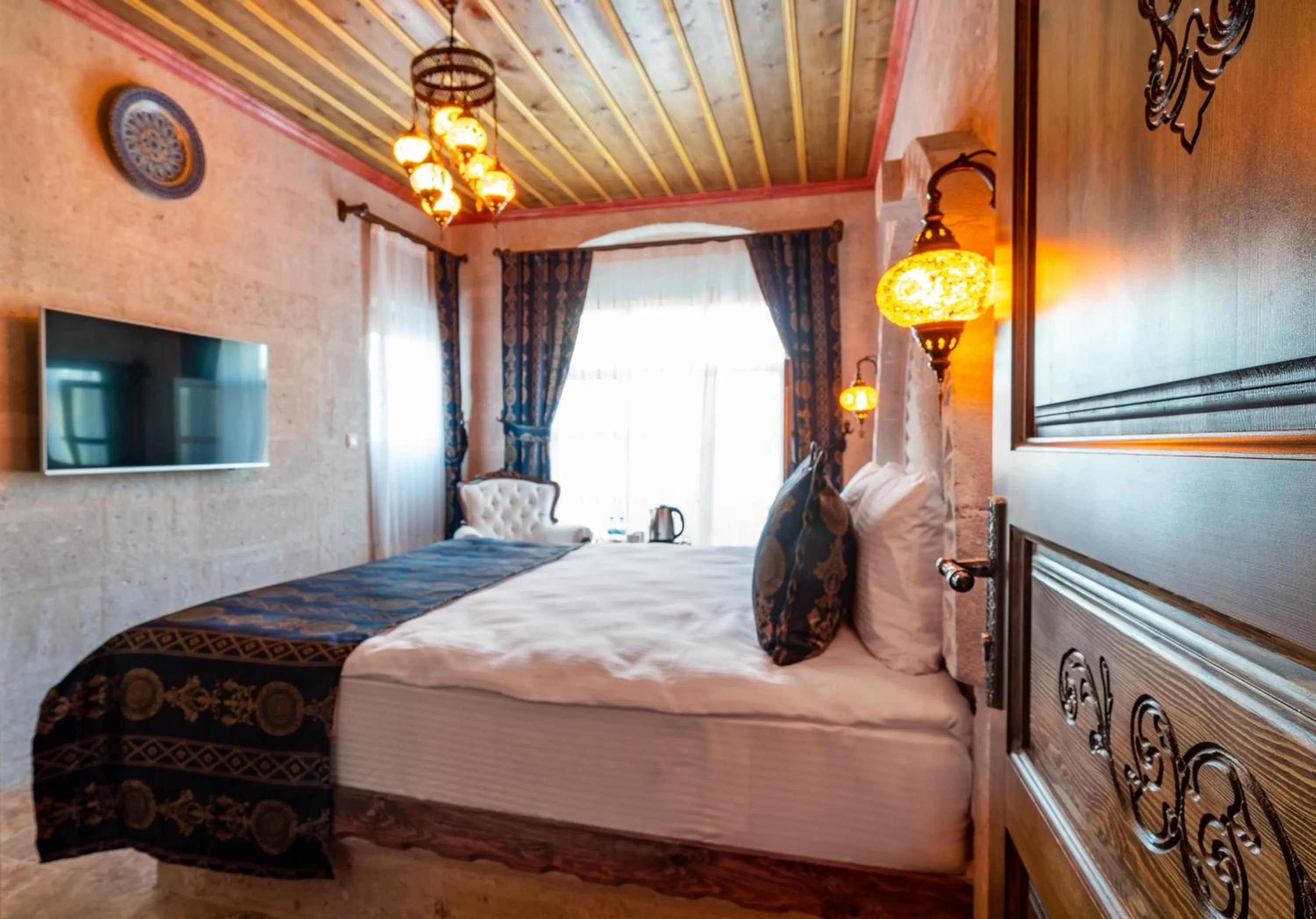 Bed in CAPPANAR CAVE HOTEL