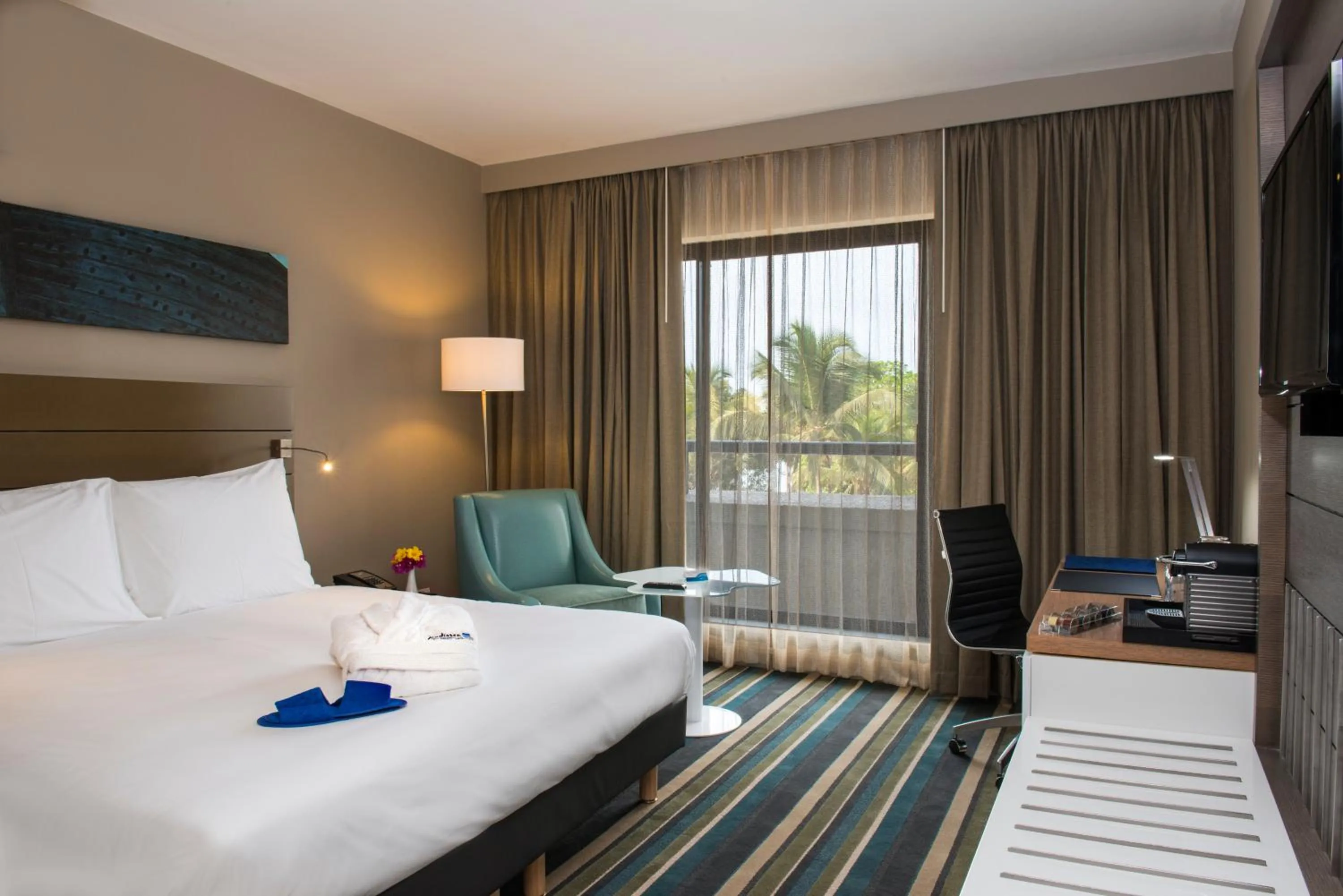 Photo of the whole room, Bed in Radisson Blu Mammy Yoko Hotel