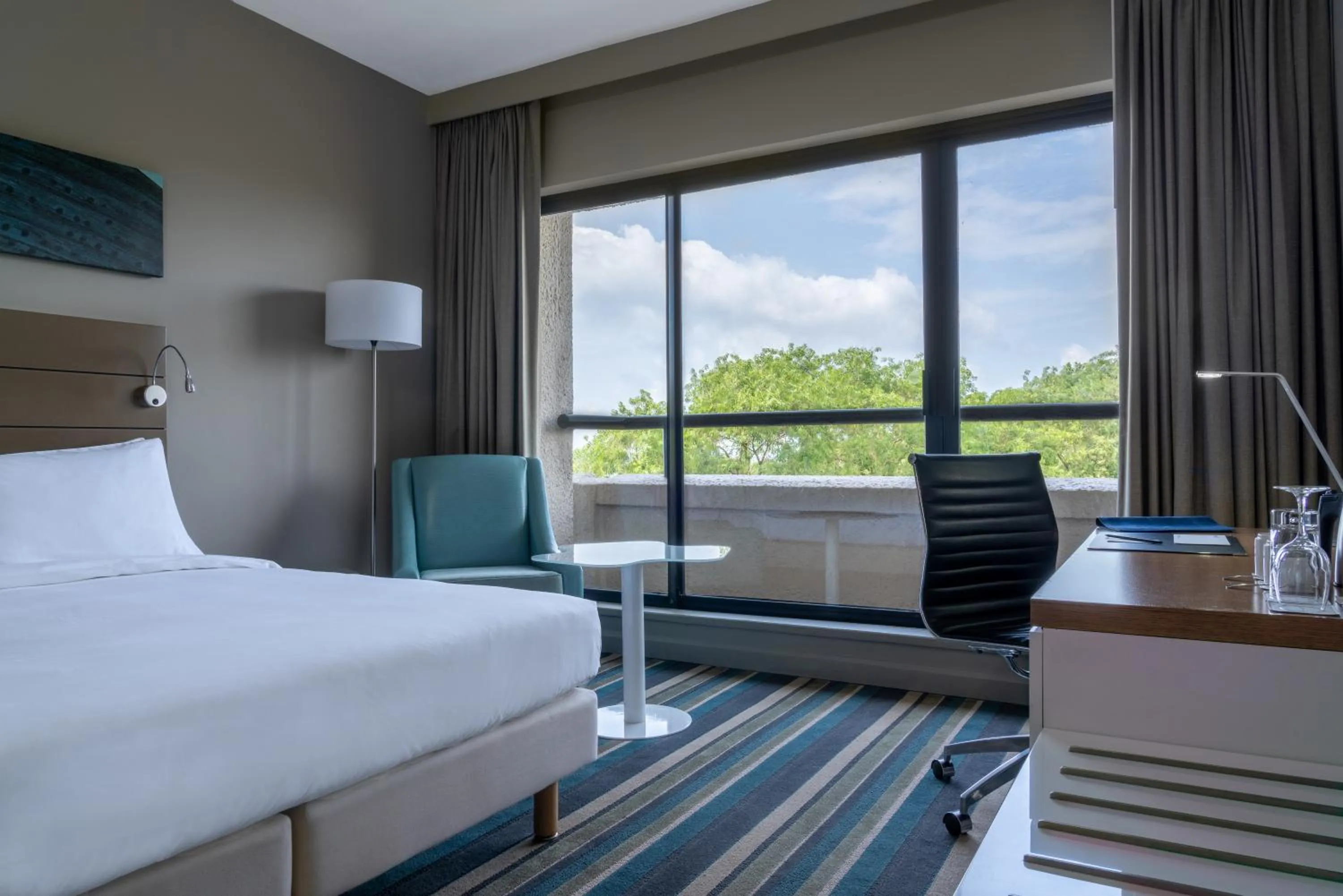 Bed in Radisson Blu Mammy Yoko Hotel