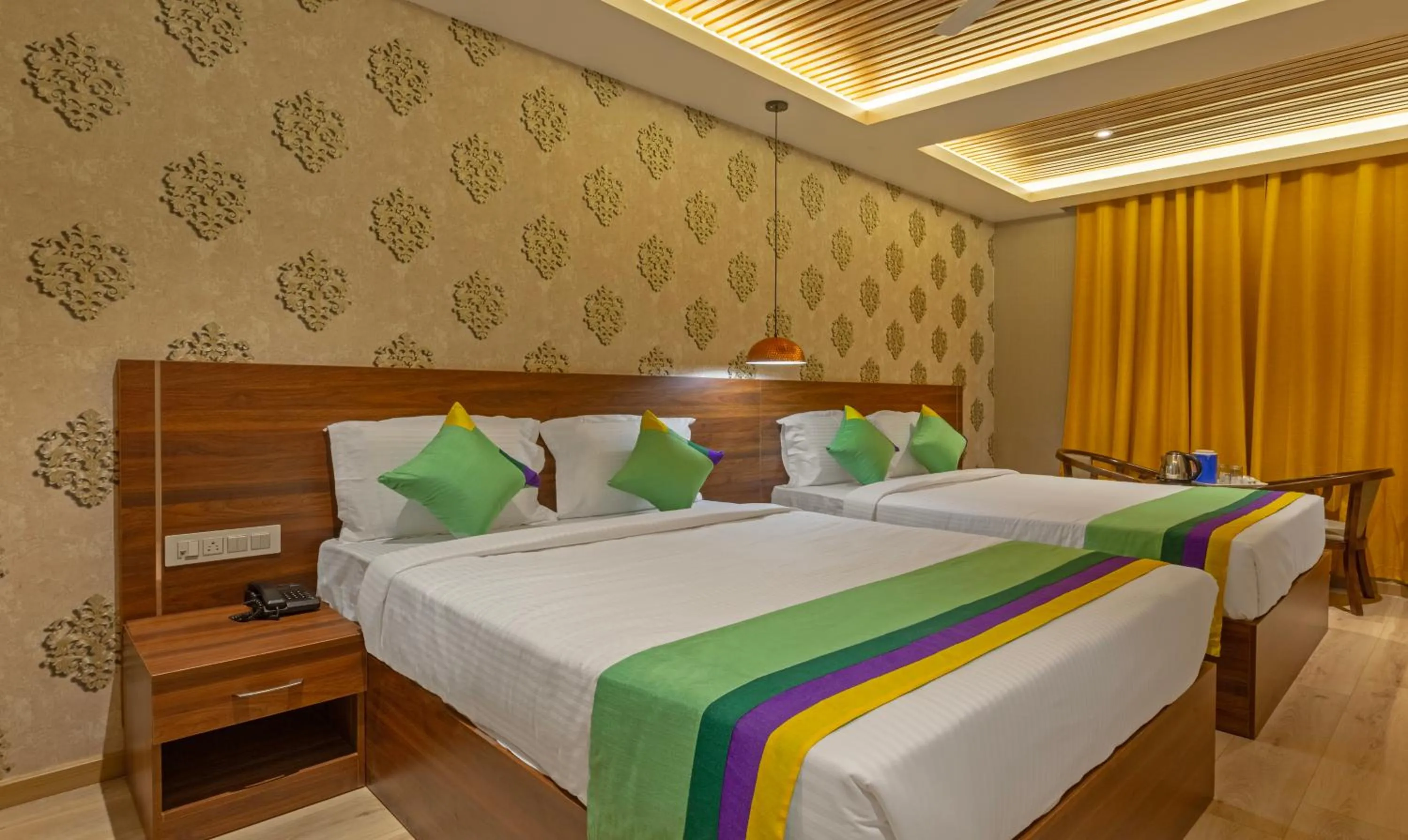 Bedroom, Bed in Treebo Windsor Heights