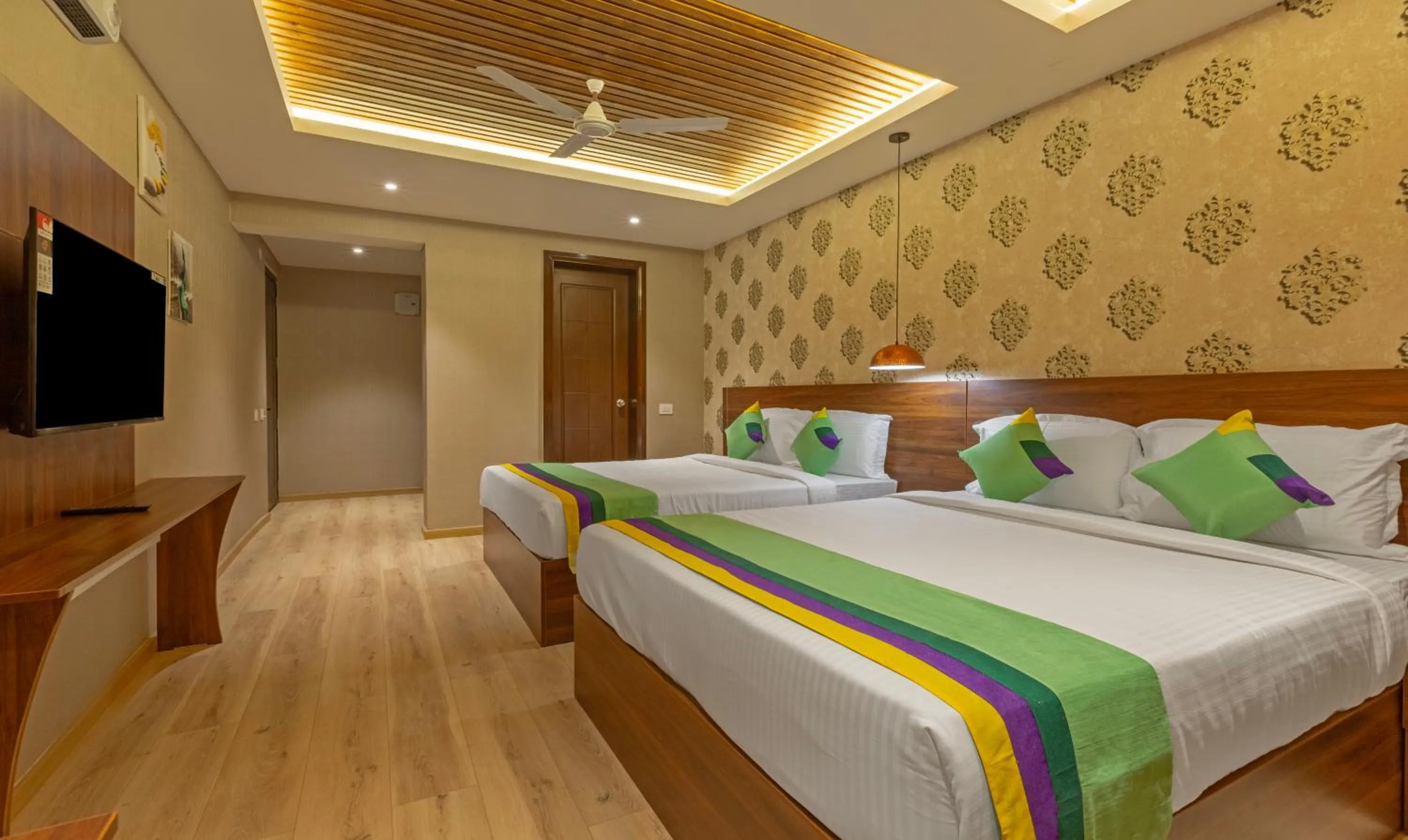 Bedroom, Bed in Treebo Windsor Heights