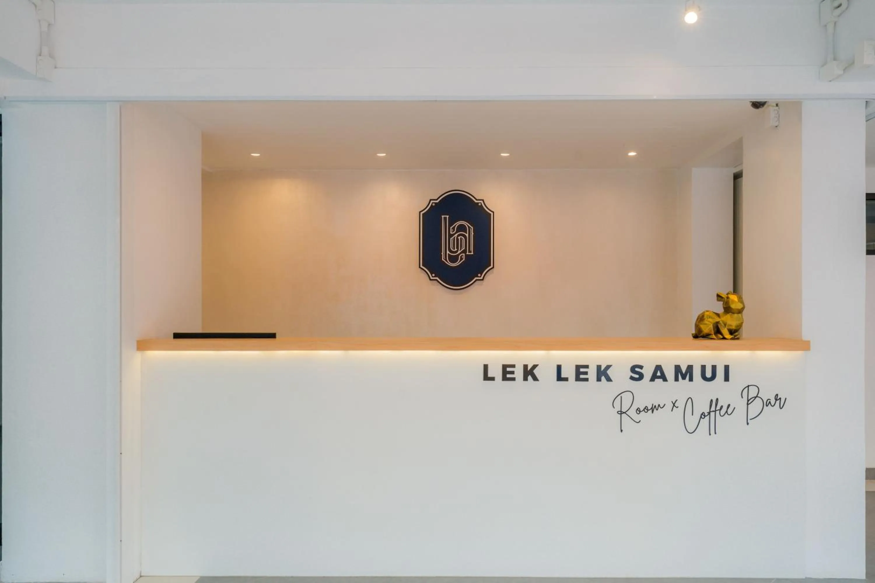 Property logo or sign in Lek Lek Samui Room X Coffee Bar