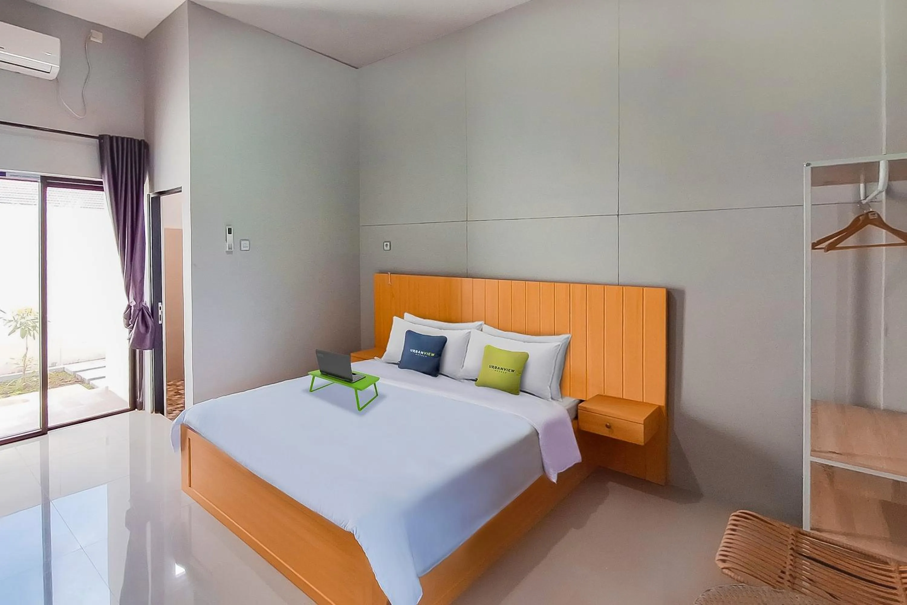 Bed in Urbanview Hotel Griya Menteng Palangkaraya by RedDoorz
