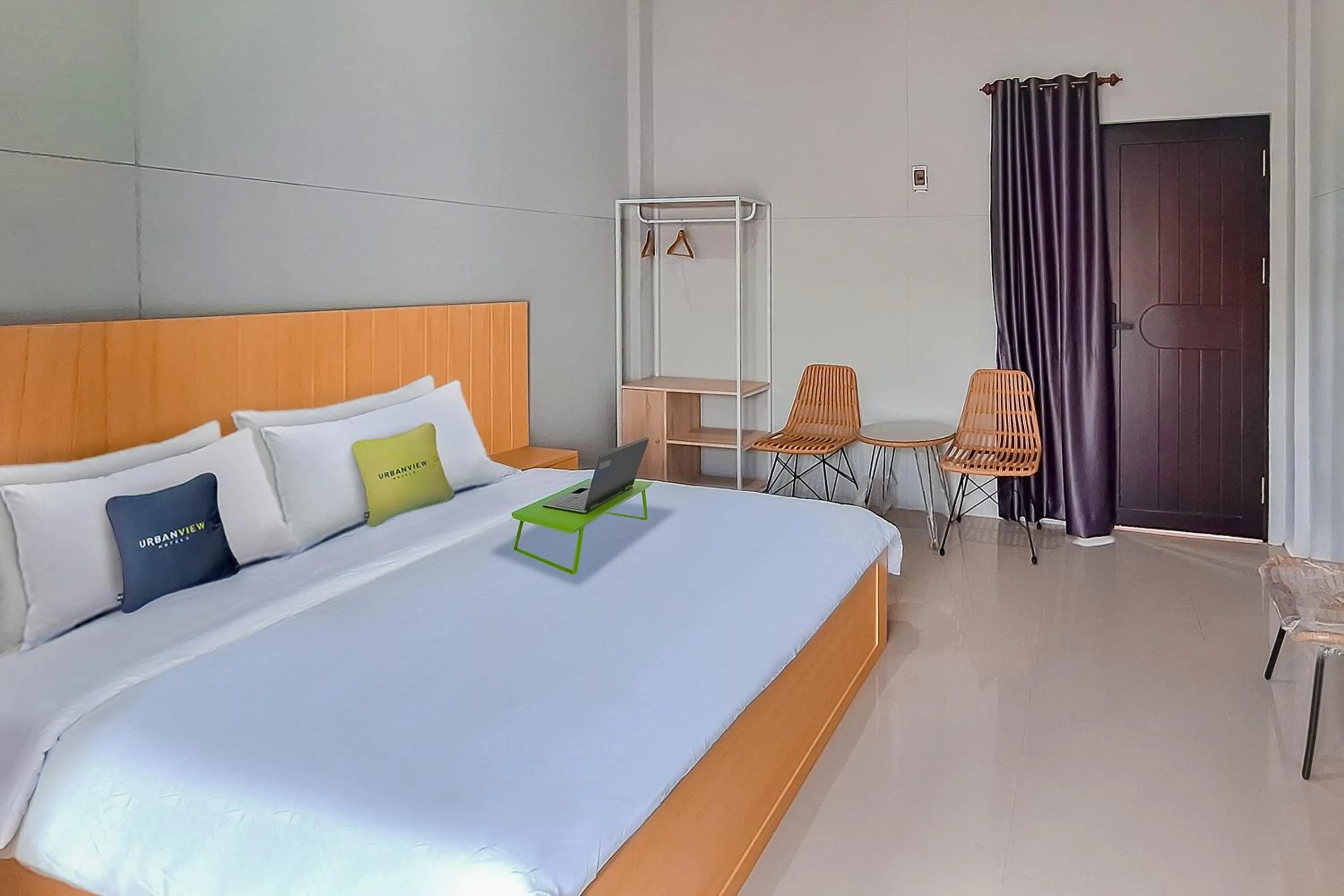 Bed in Urbanview Hotel Griya Menteng Palangkaraya by RedDoorz