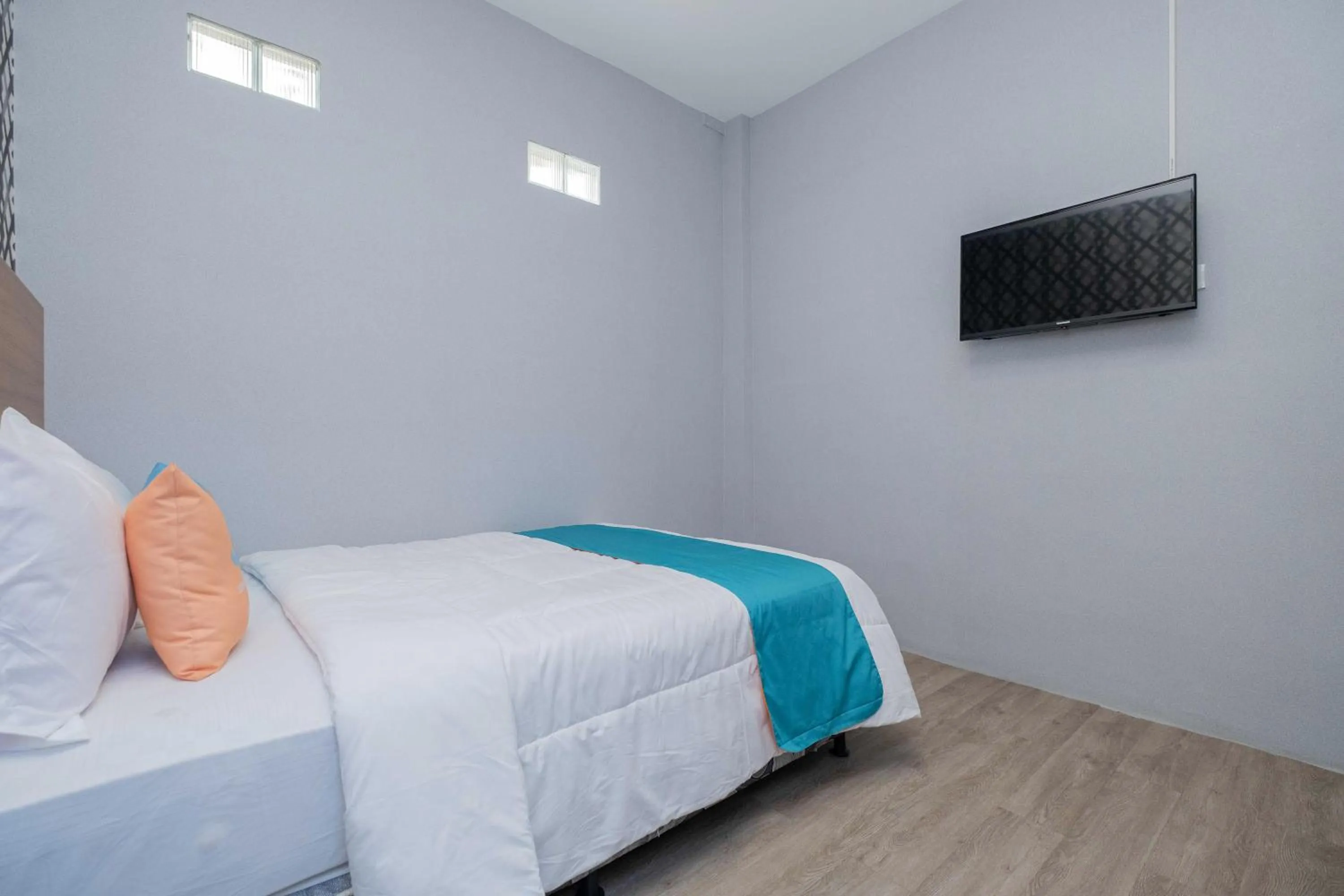 Bedroom, Bed in Sans WM Hotel Blitar