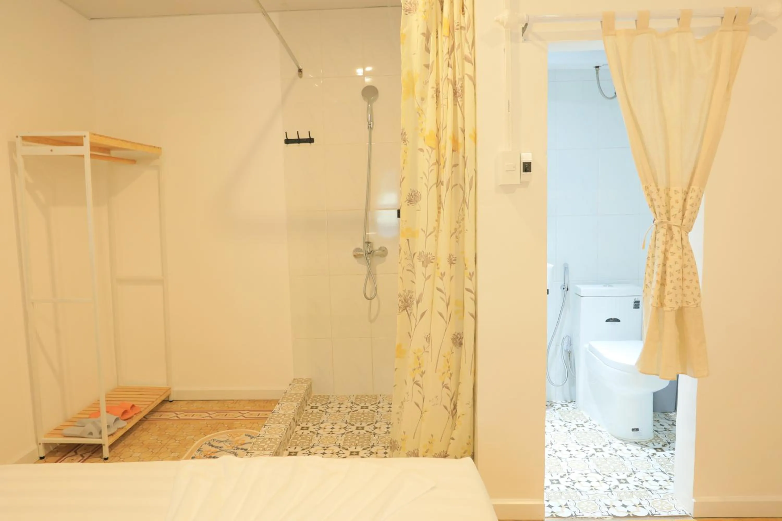 Shower in LA VIE EN ROSE 2 Hotel