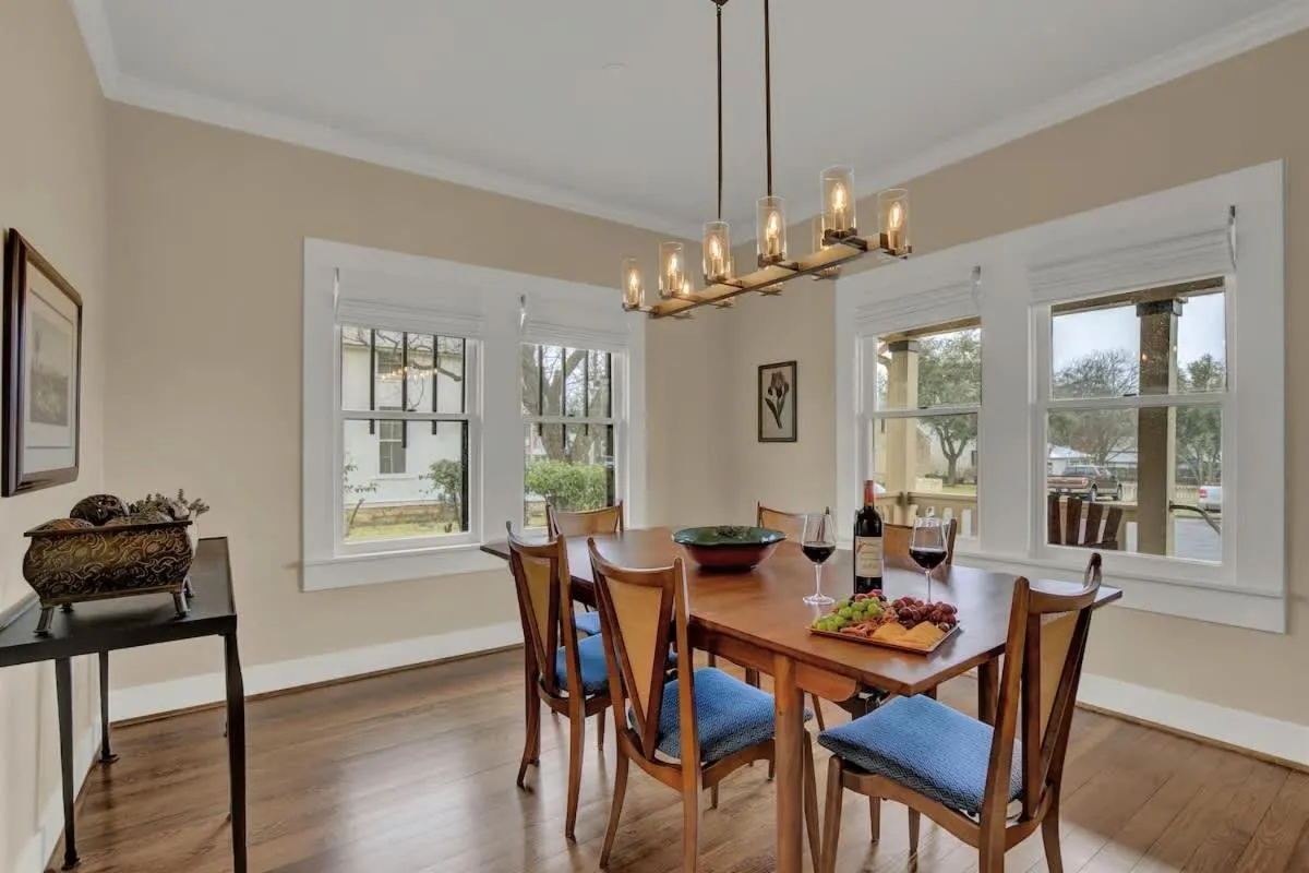 Dining area in Charming Craftsman Home!-2 BLKS from Main St!