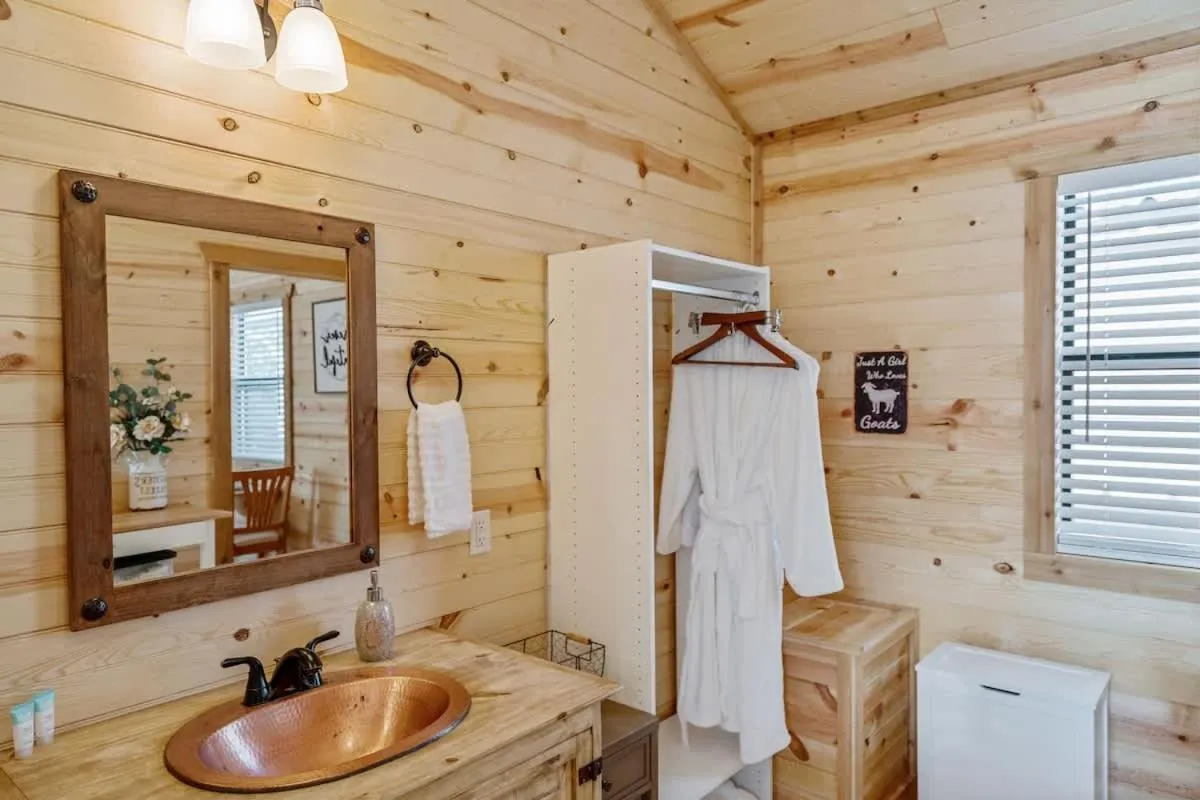 Bathroom in Fancy Cabin Right on Main St!