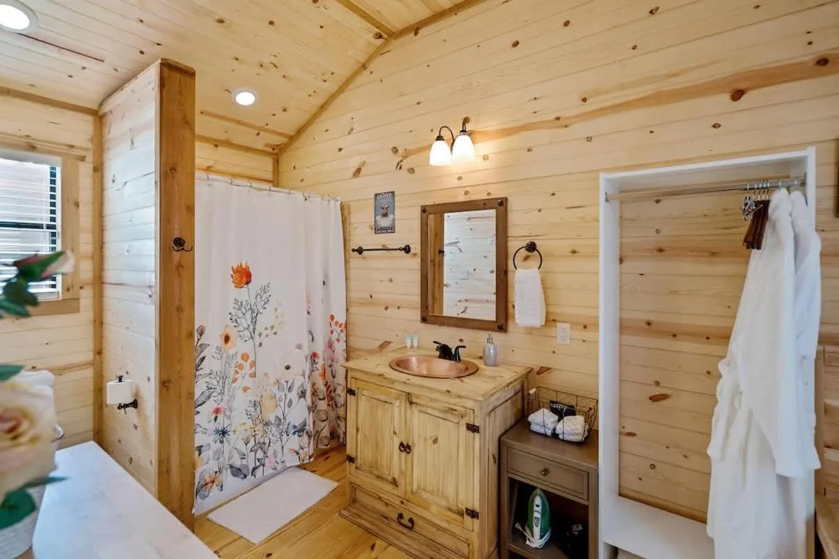 Bathroom in Fancy Cabin Right on Main St!