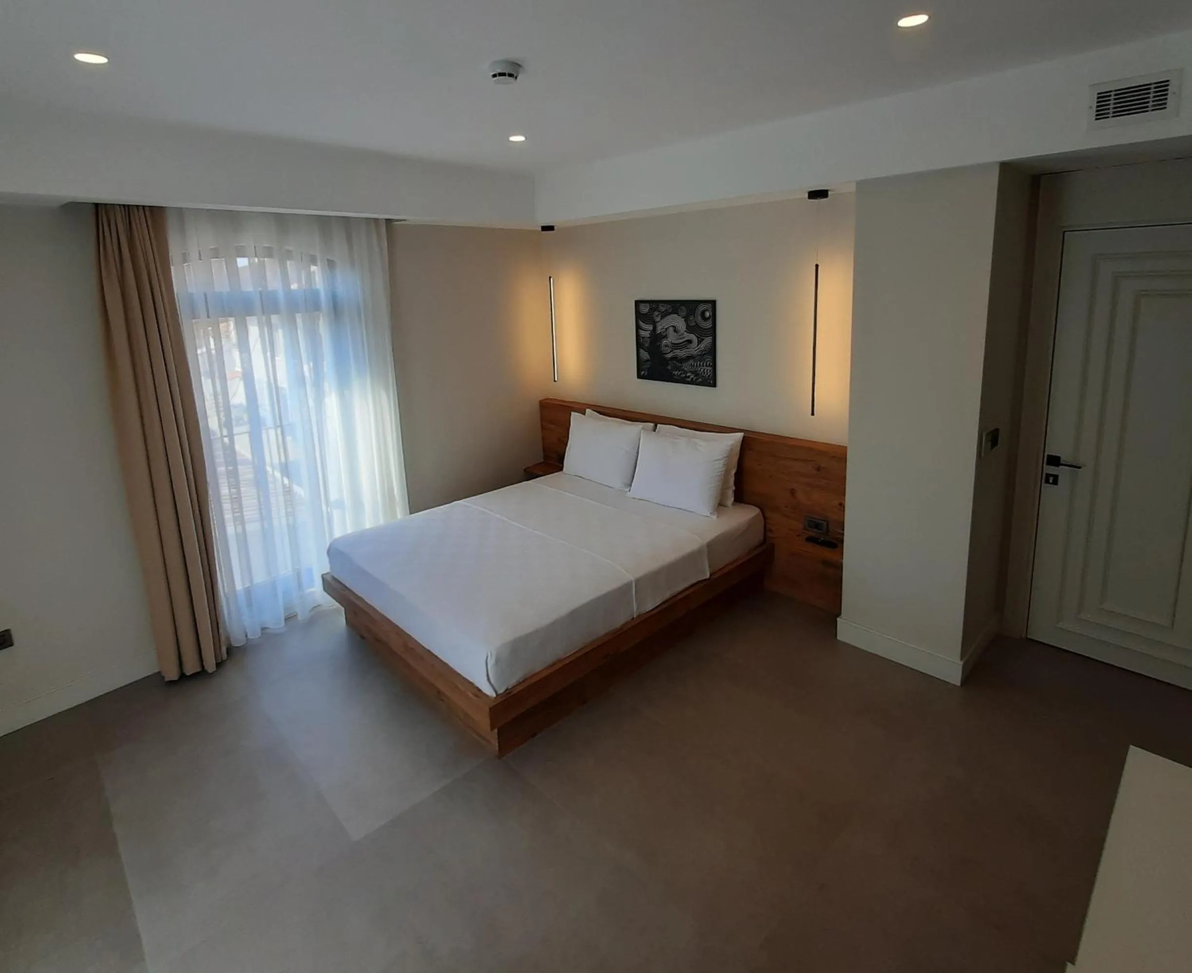 Photo of the whole room, Bed in Nilus Urla