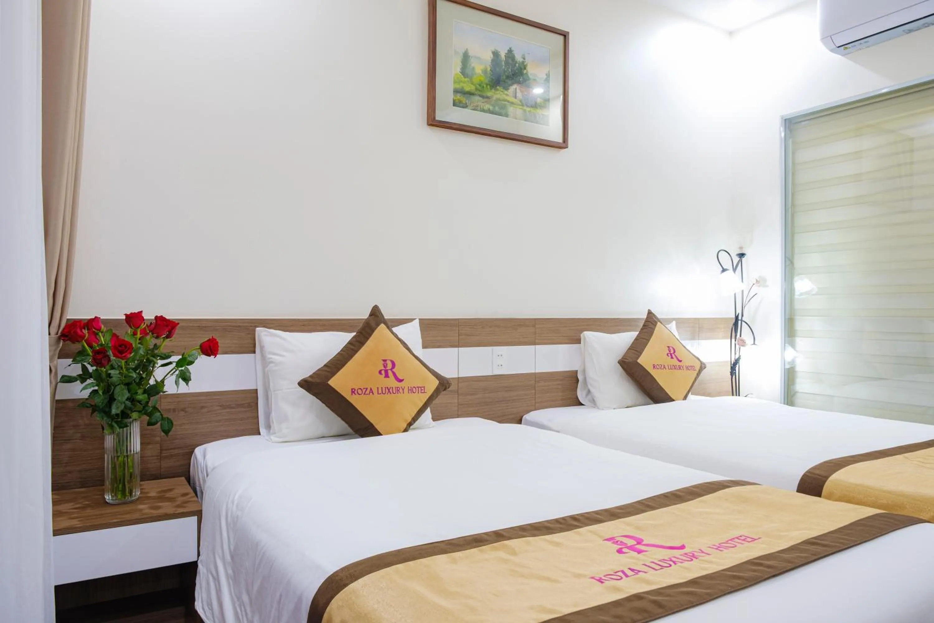 Bed in Roza Palace Cat Ba