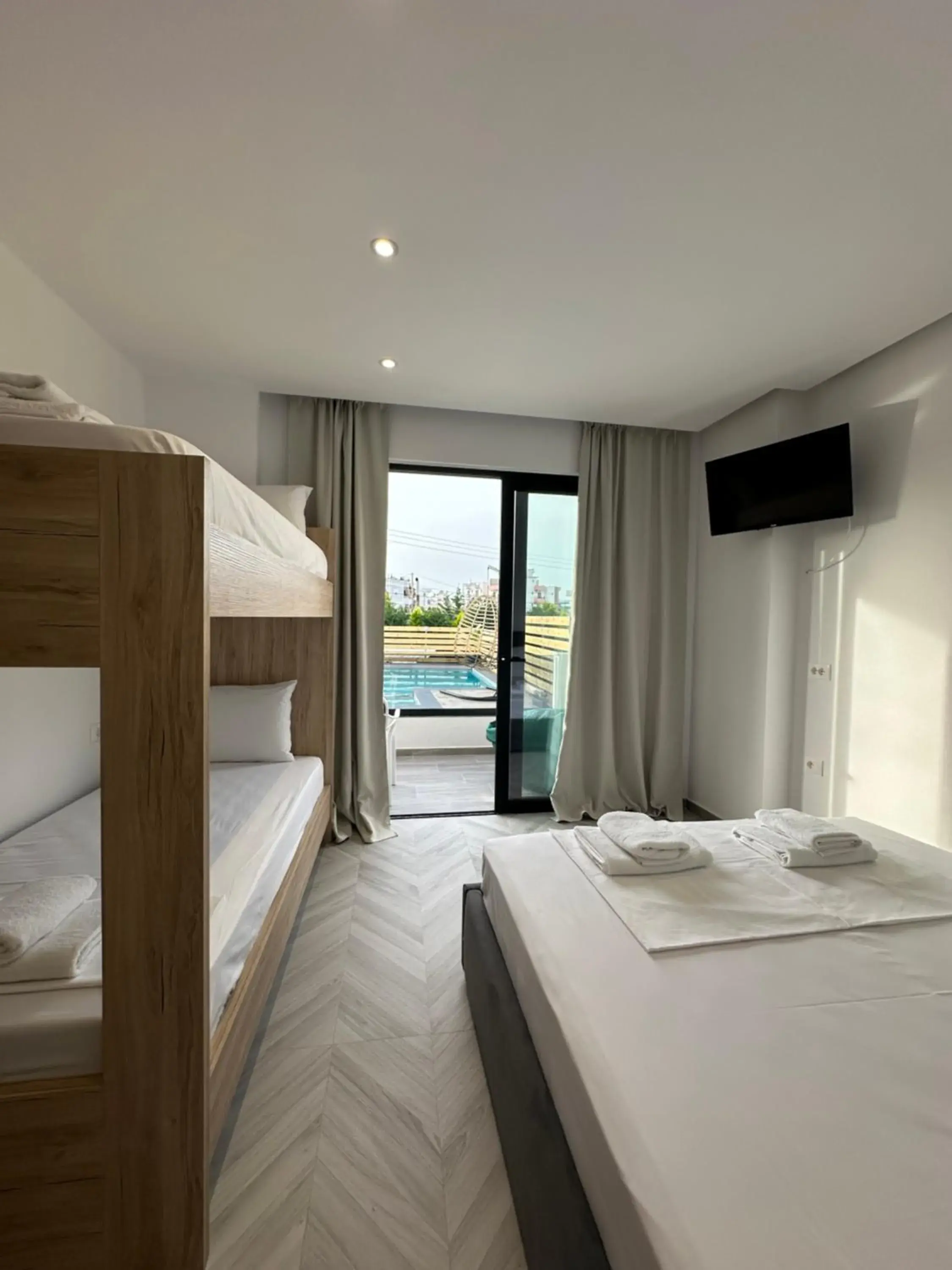 Quadruple Room with Pool View in Noa Boutique Hotel Quadruple Room with Pool View in Noa Boutique Hotel