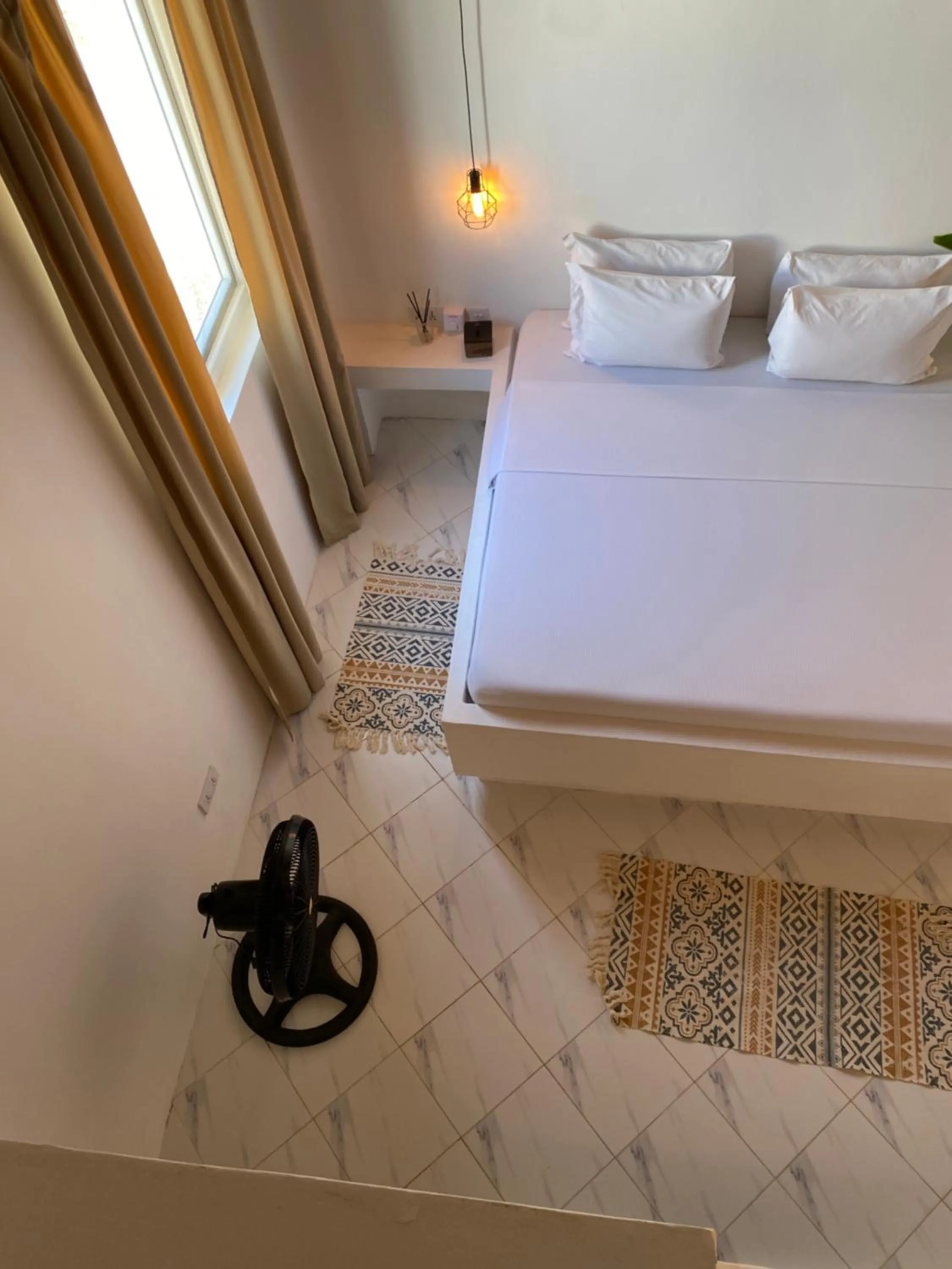 Photo of the whole room, Bed in Cactus lodge Zanzibar