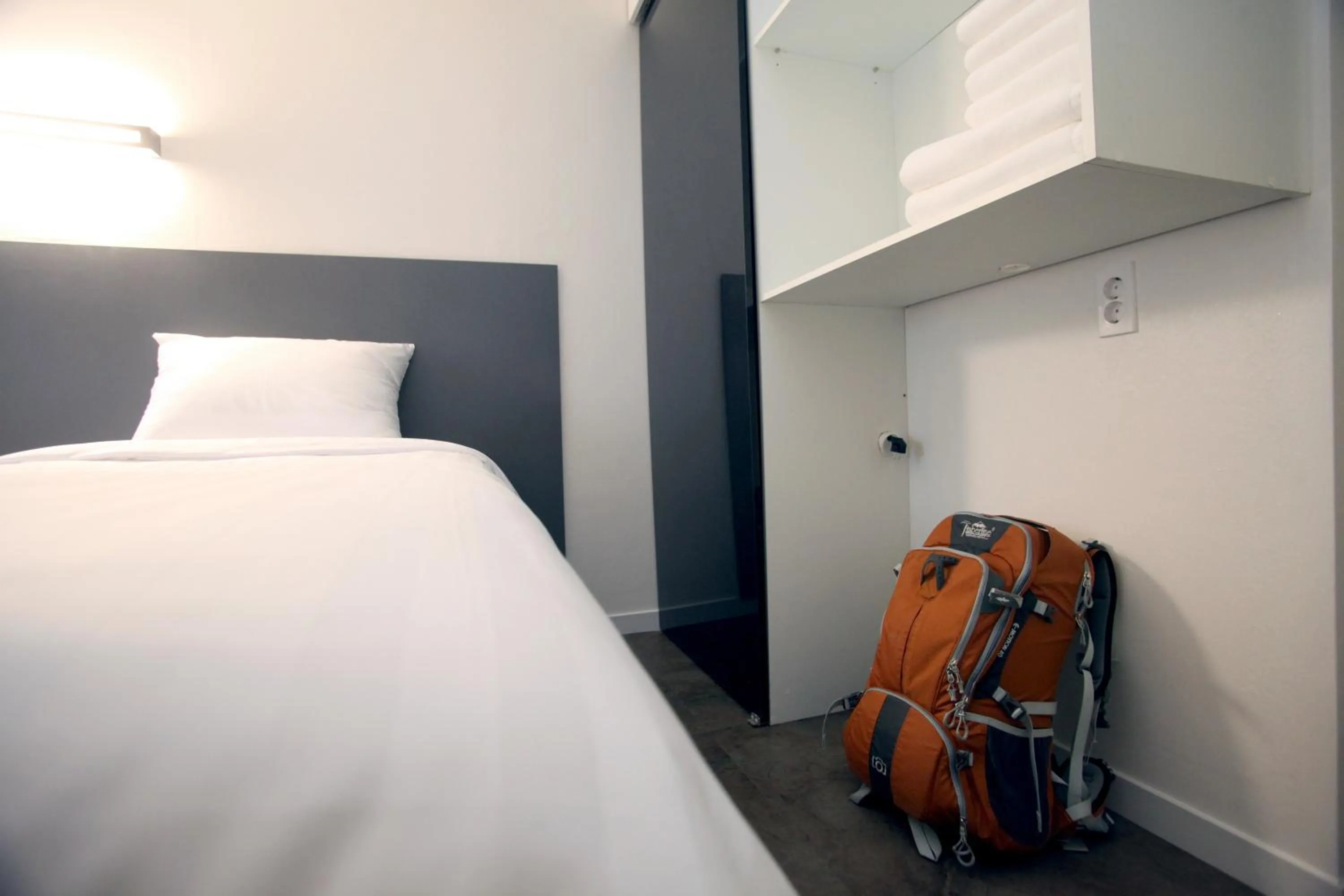 Photo of the whole room, Bed in KSTAR METRO Hotel