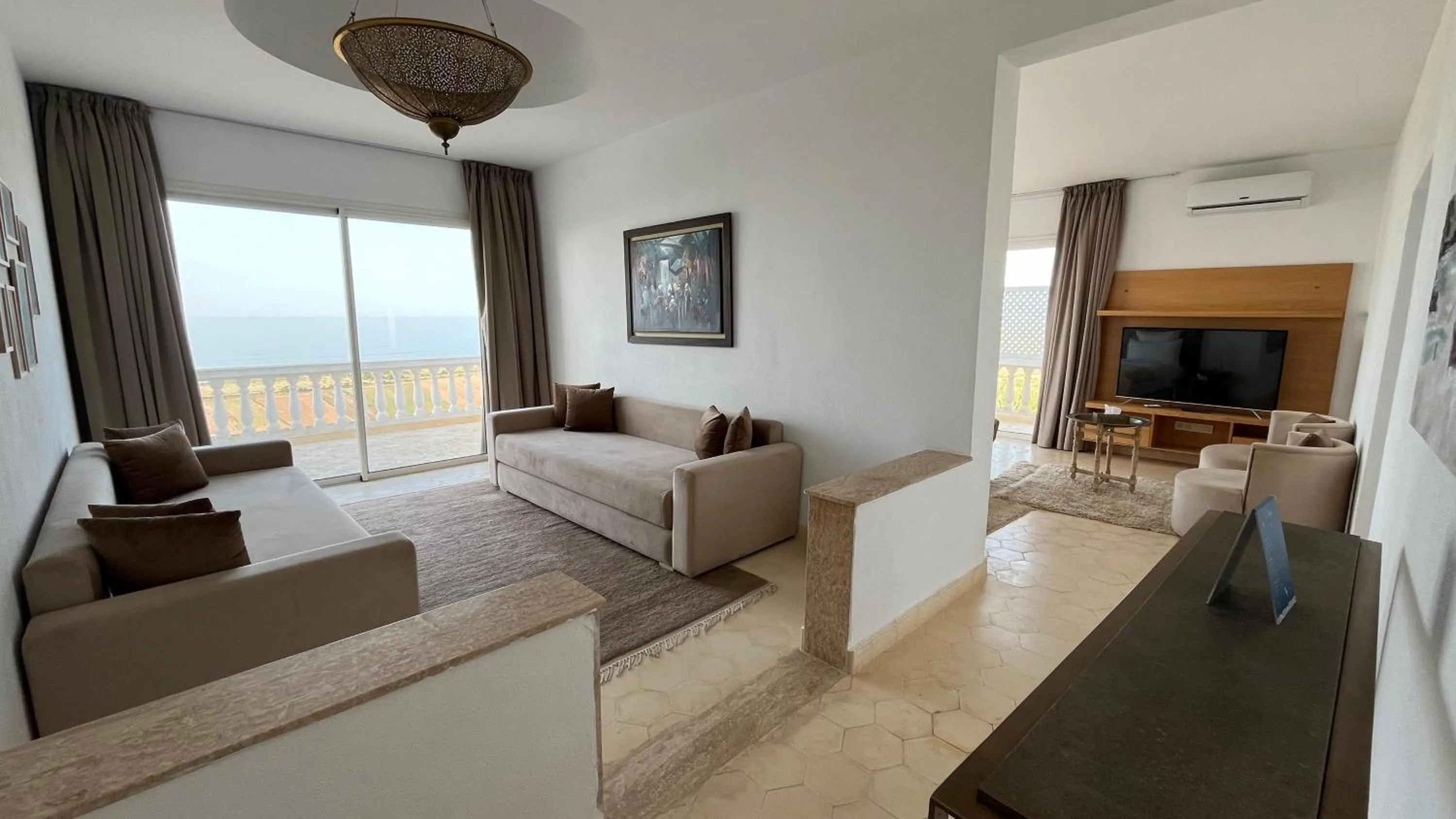 Communal lounge/ TV room in Villa La Falaise