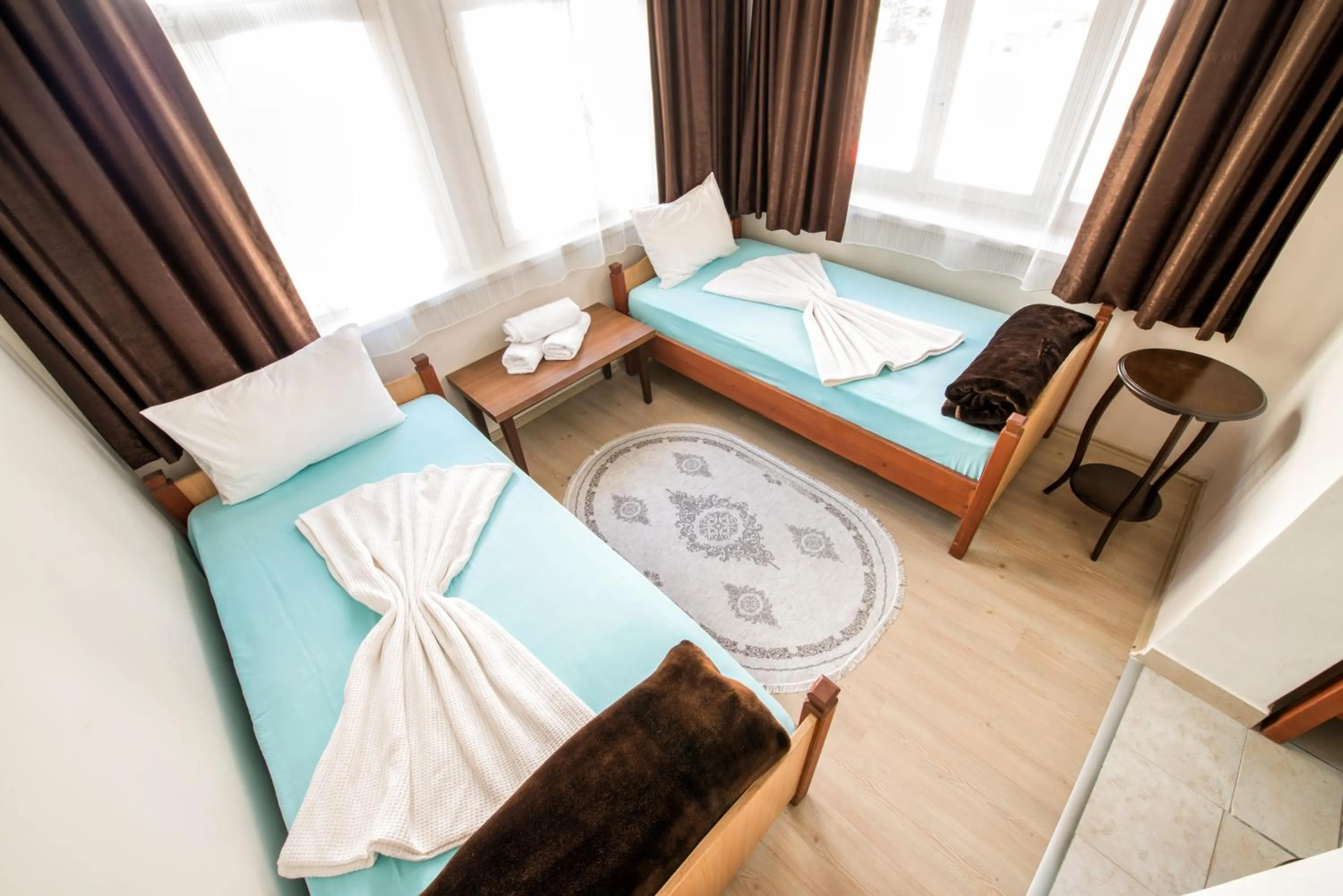 Bed in Yellow Rose Pansiyon