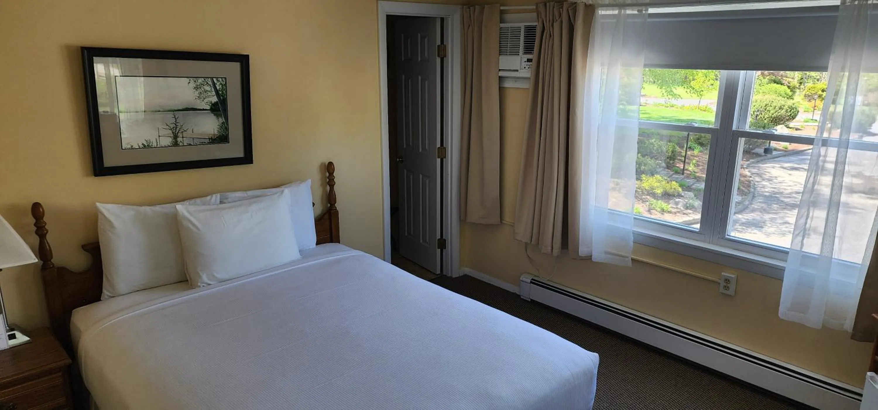 Bed in Wilson Lake Inn