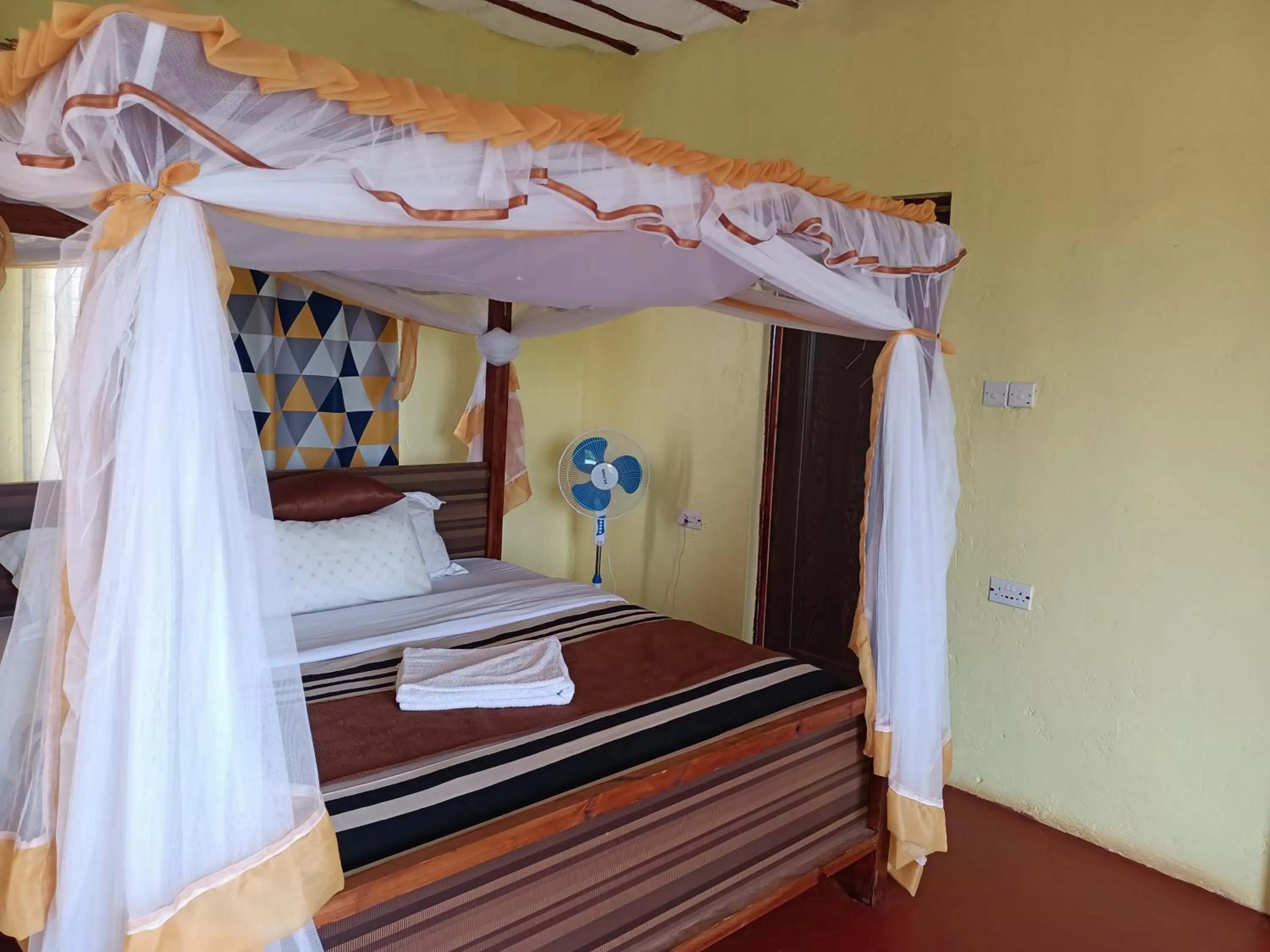 Bed in Tausa Tsavo Eco Lodge