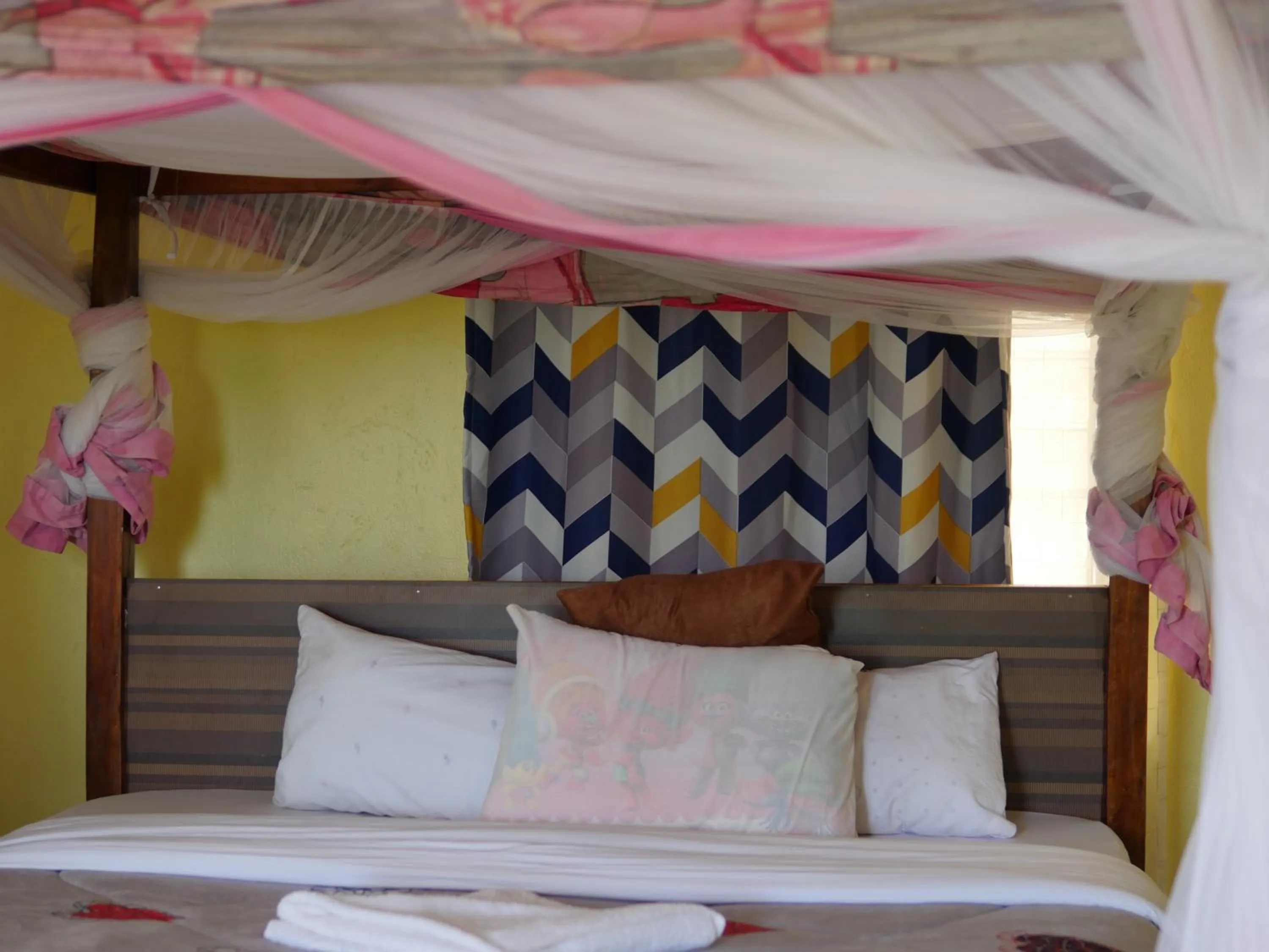 Bed in Tausa Tsavo Eco Lodge