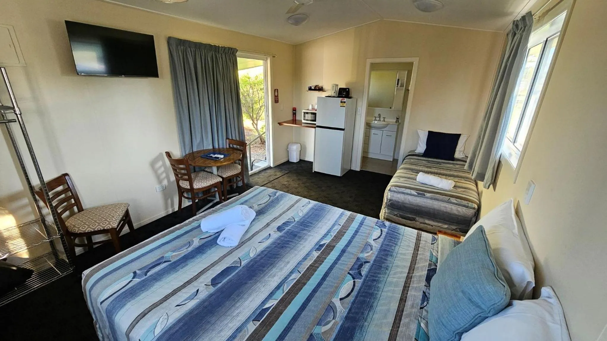 Bedroom, Bed in Mitchell Motel & Cabins