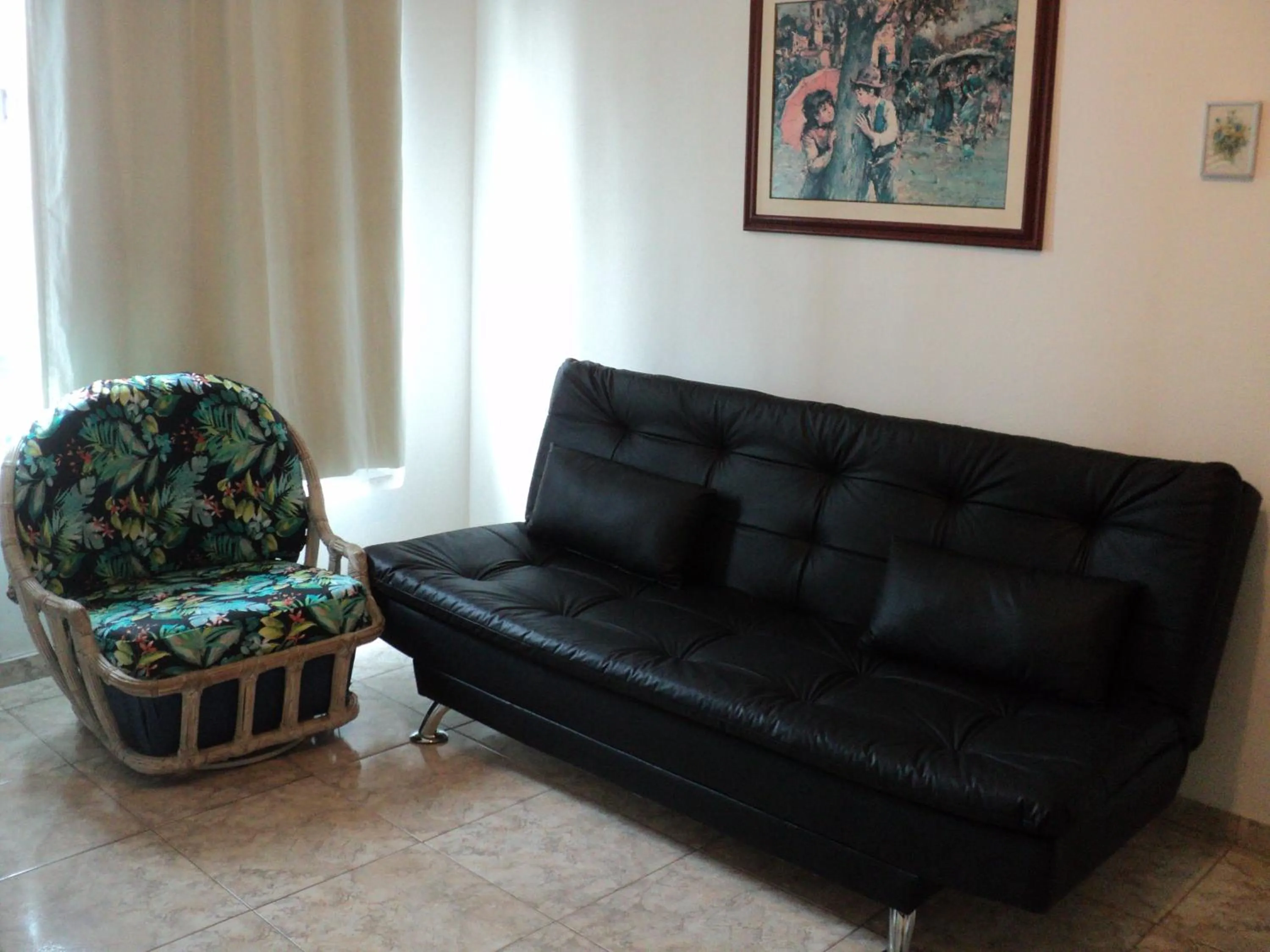 Living room in Apartamento Aconchegante