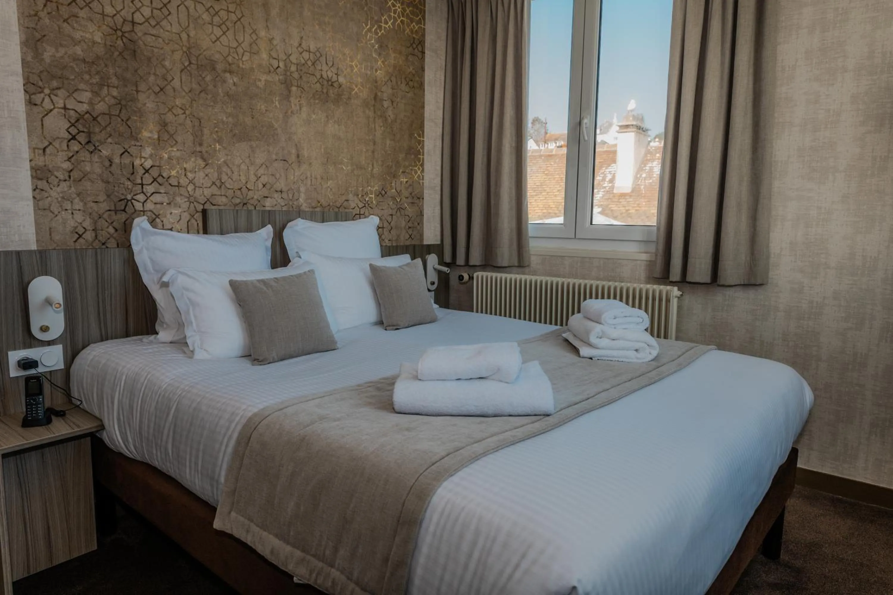 Bed in Le Grand Hôtel de la Marine "face à la mer"