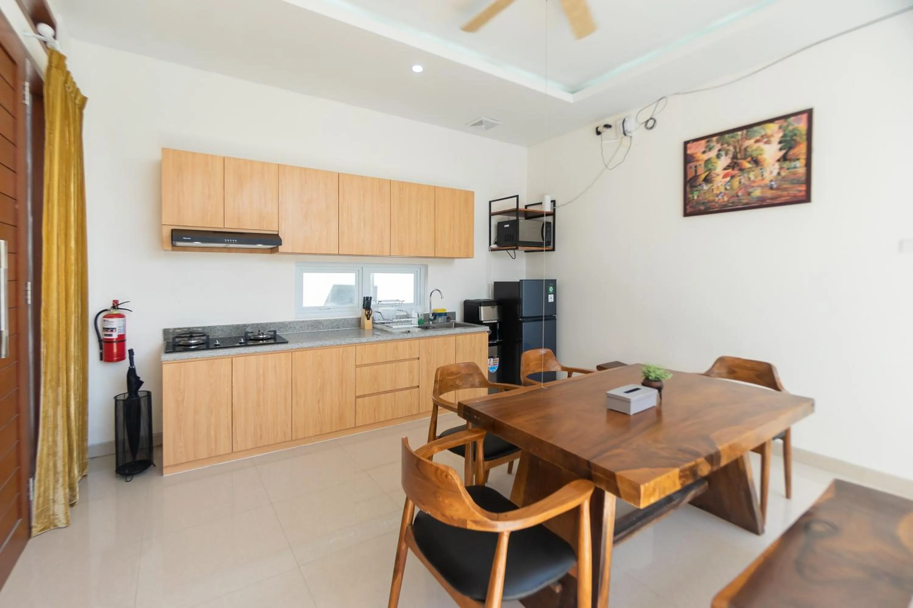 Kitchen or kitchenette in Villa Berlian Kuta