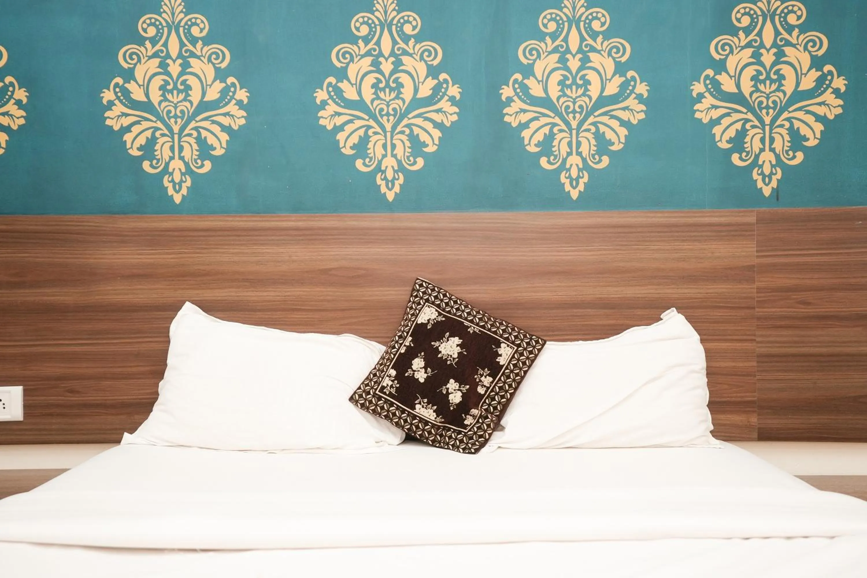 Bed in Hotel Mumbai Residency