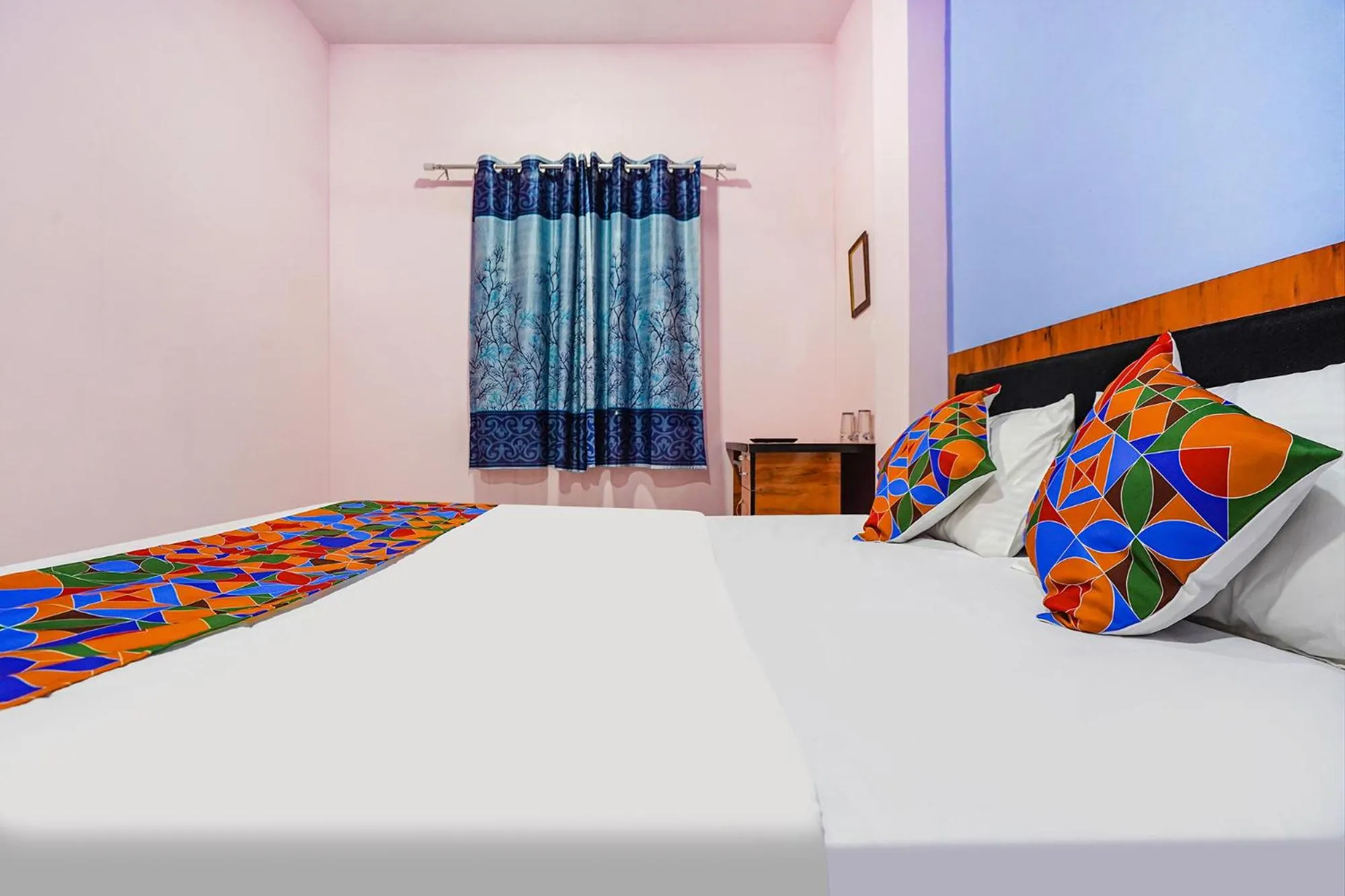 Bed in FabExpress Evaan Deluxe Rooms