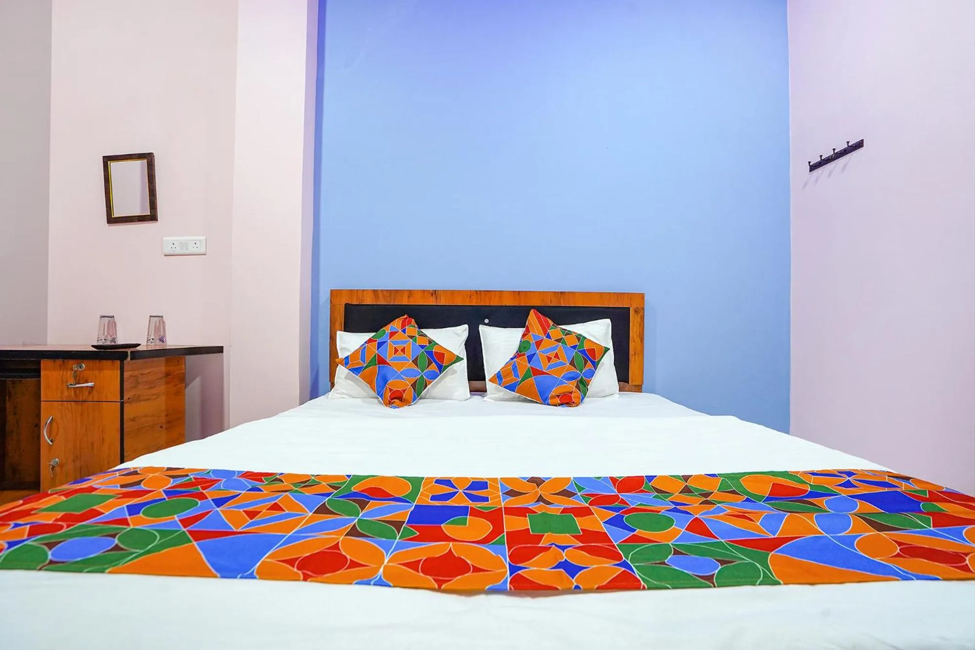 Bed in FabExpress Evaan Deluxe Rooms