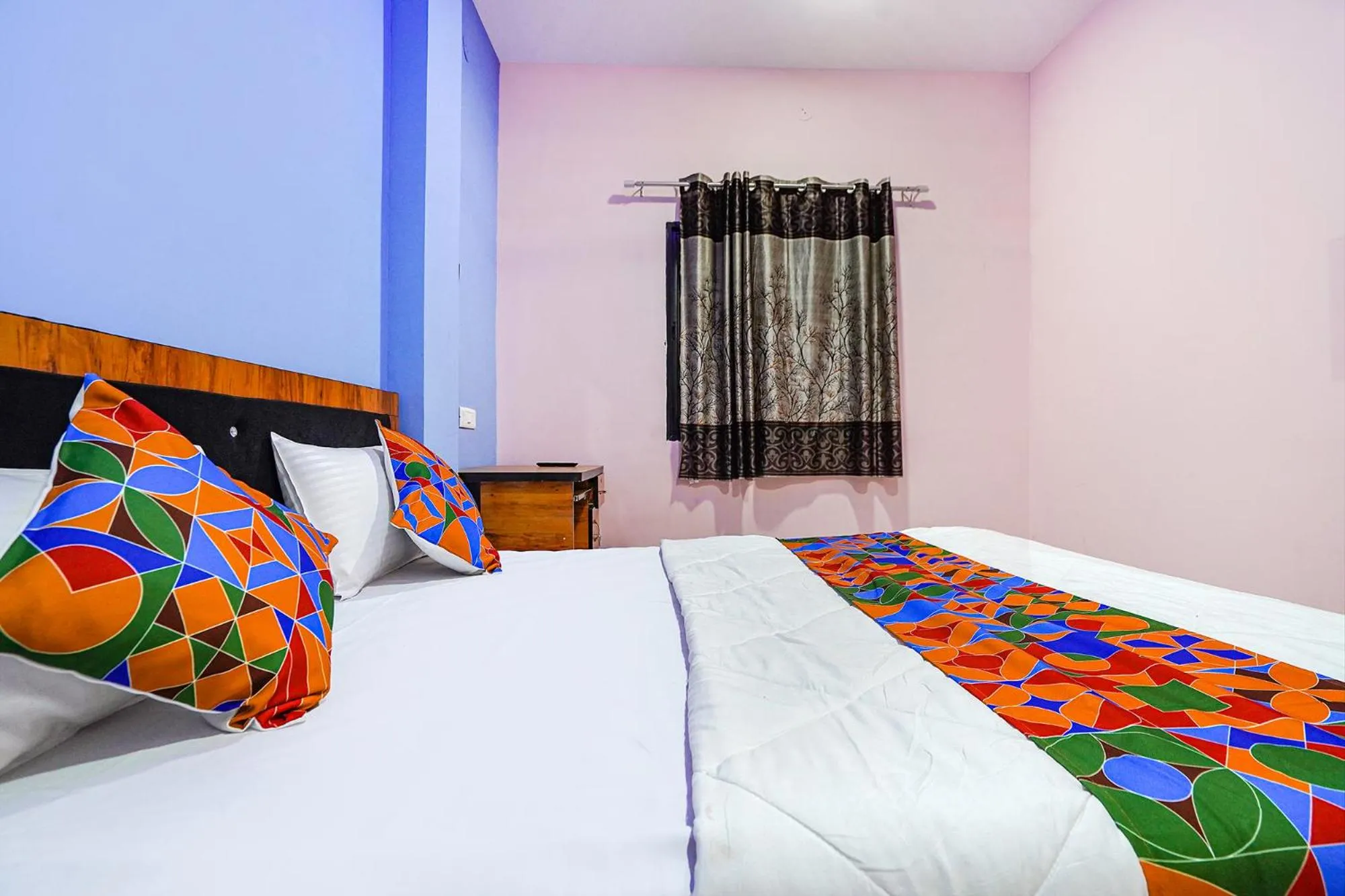 Bed in FabExpress Evaan Deluxe Rooms