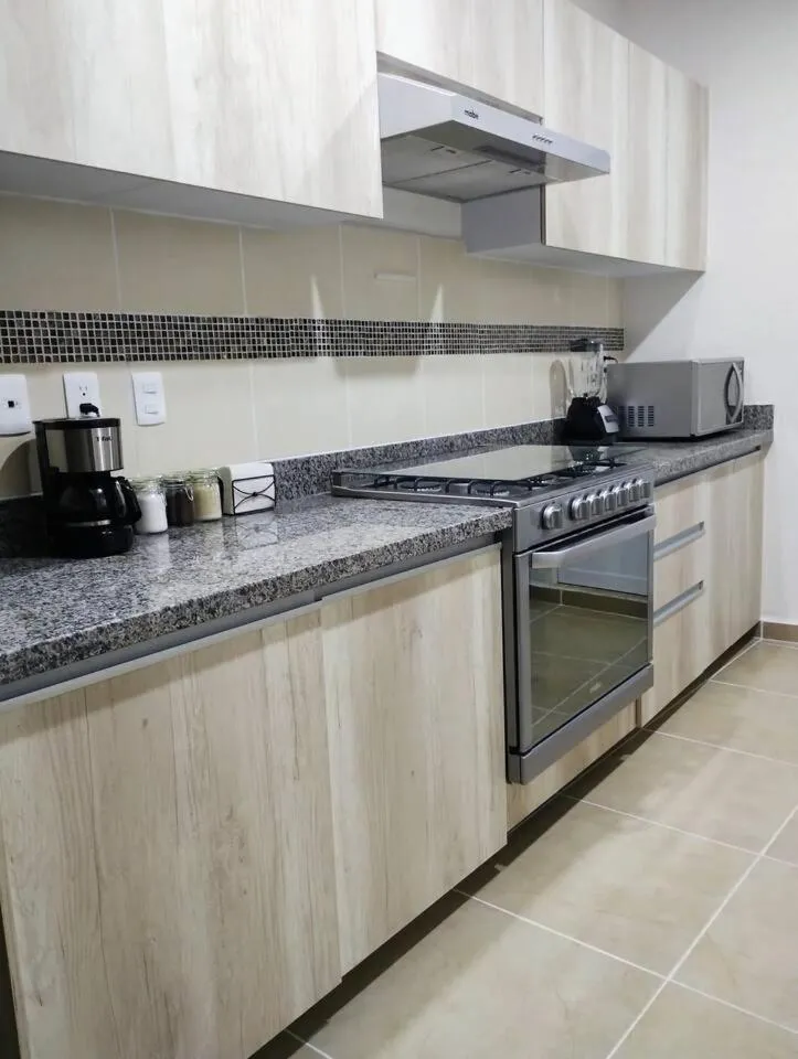 Kitchen or kitchenette in Departamento tres listones