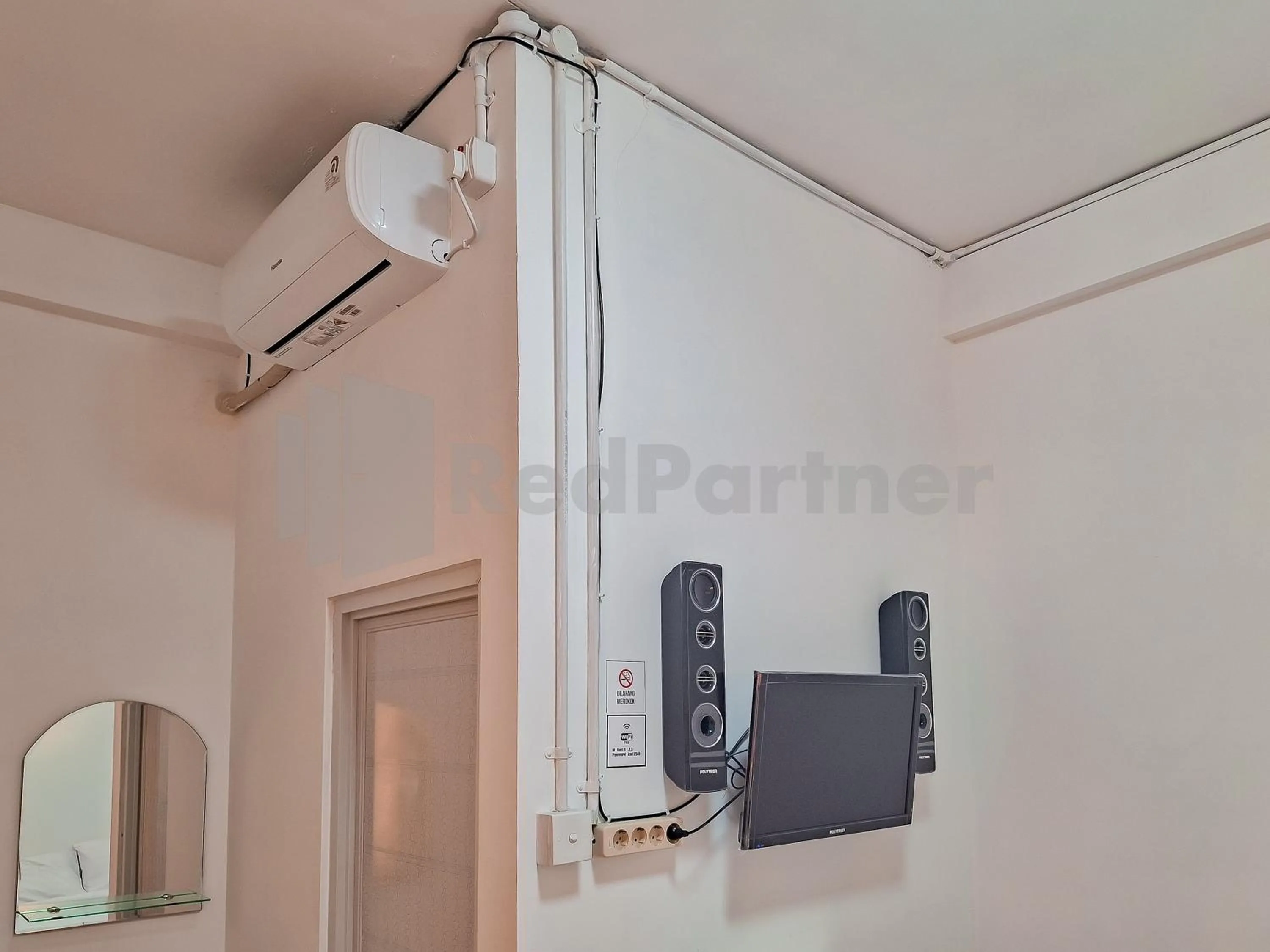 Bedroom in Adam Guesthouse Mitra RedDoorz