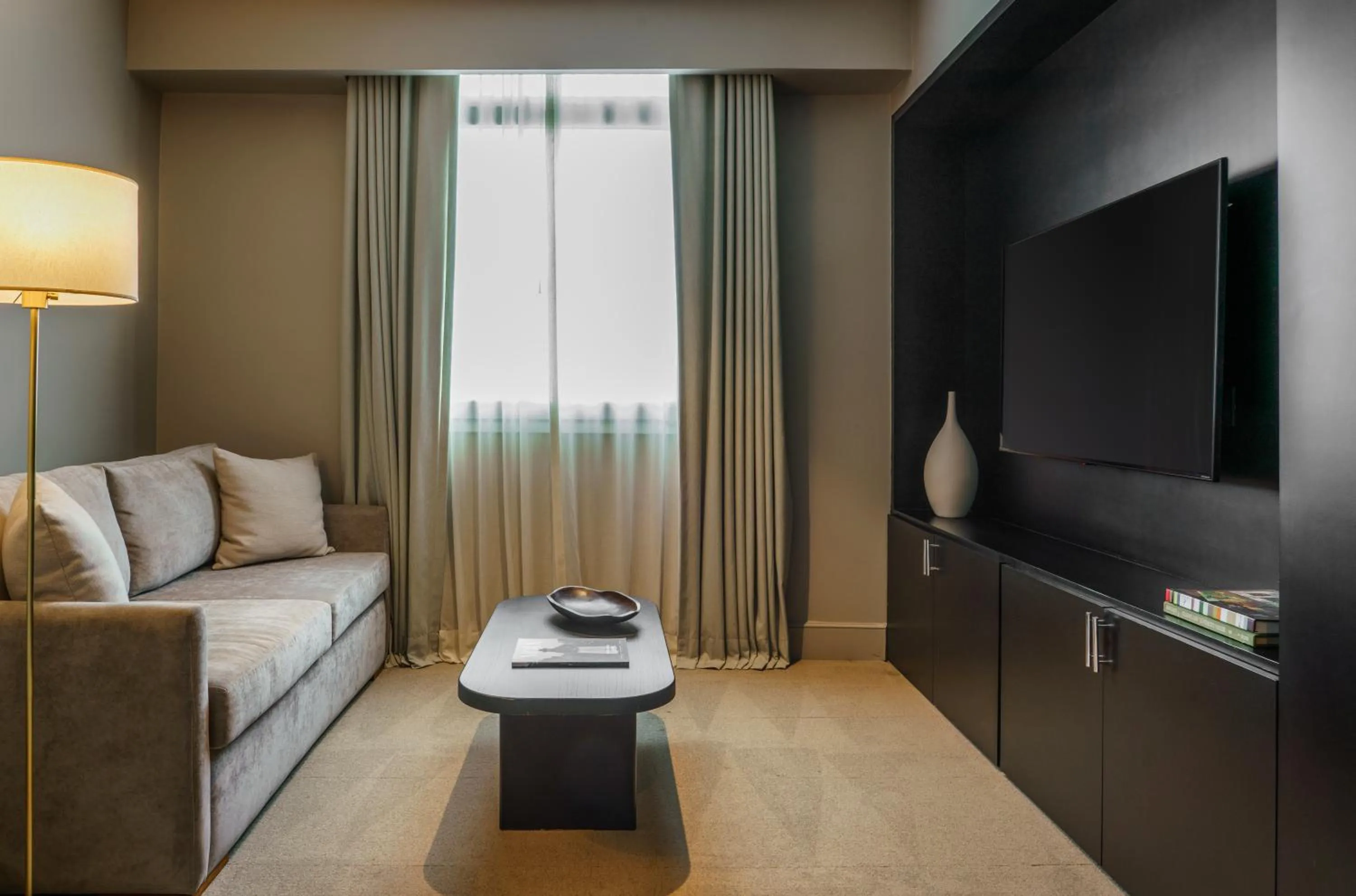 Communal lounge/ TV room in Casa Lucia Member of Melia Collection