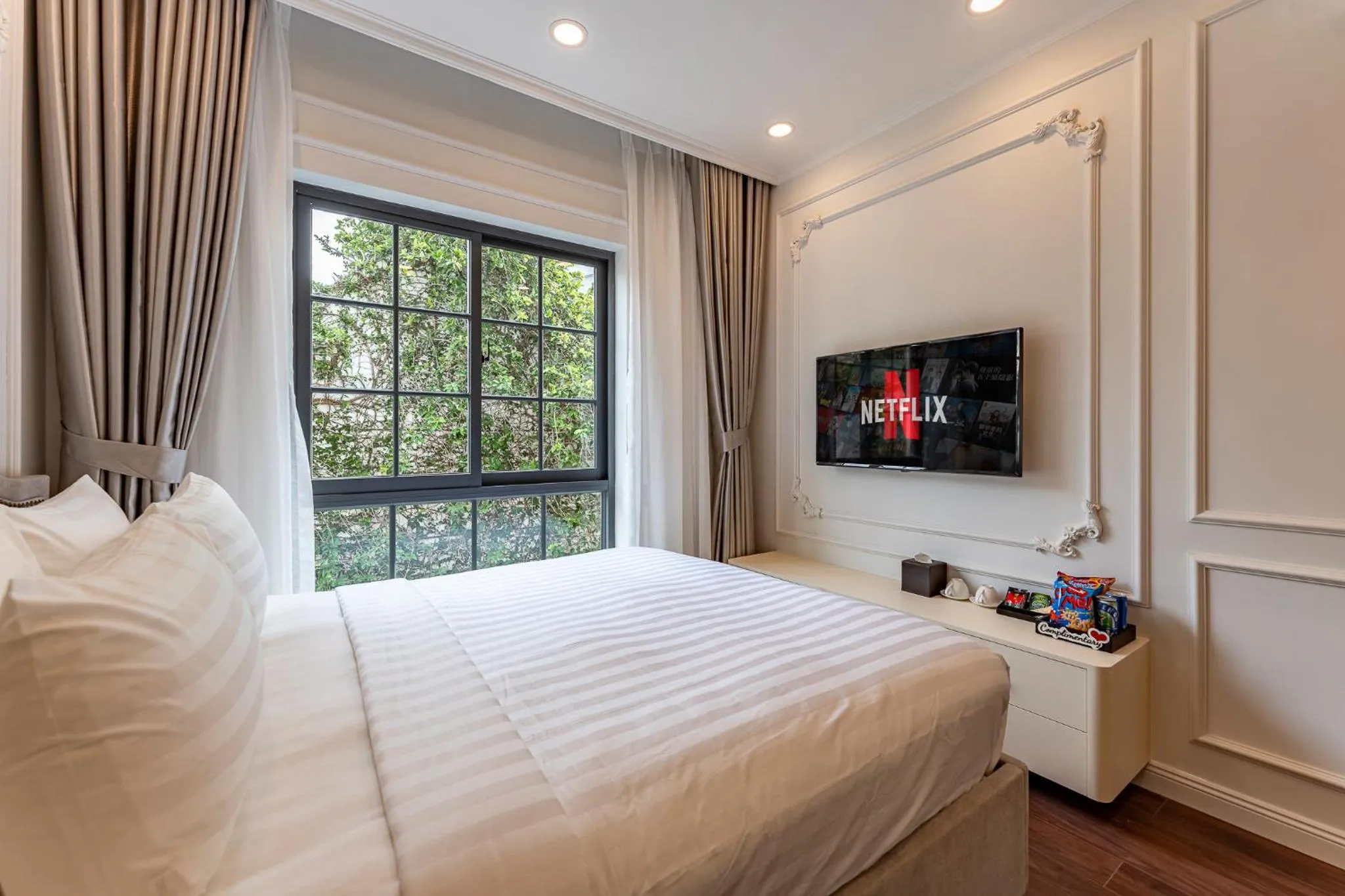 Bed in Golden Sun Apartment & Hotel