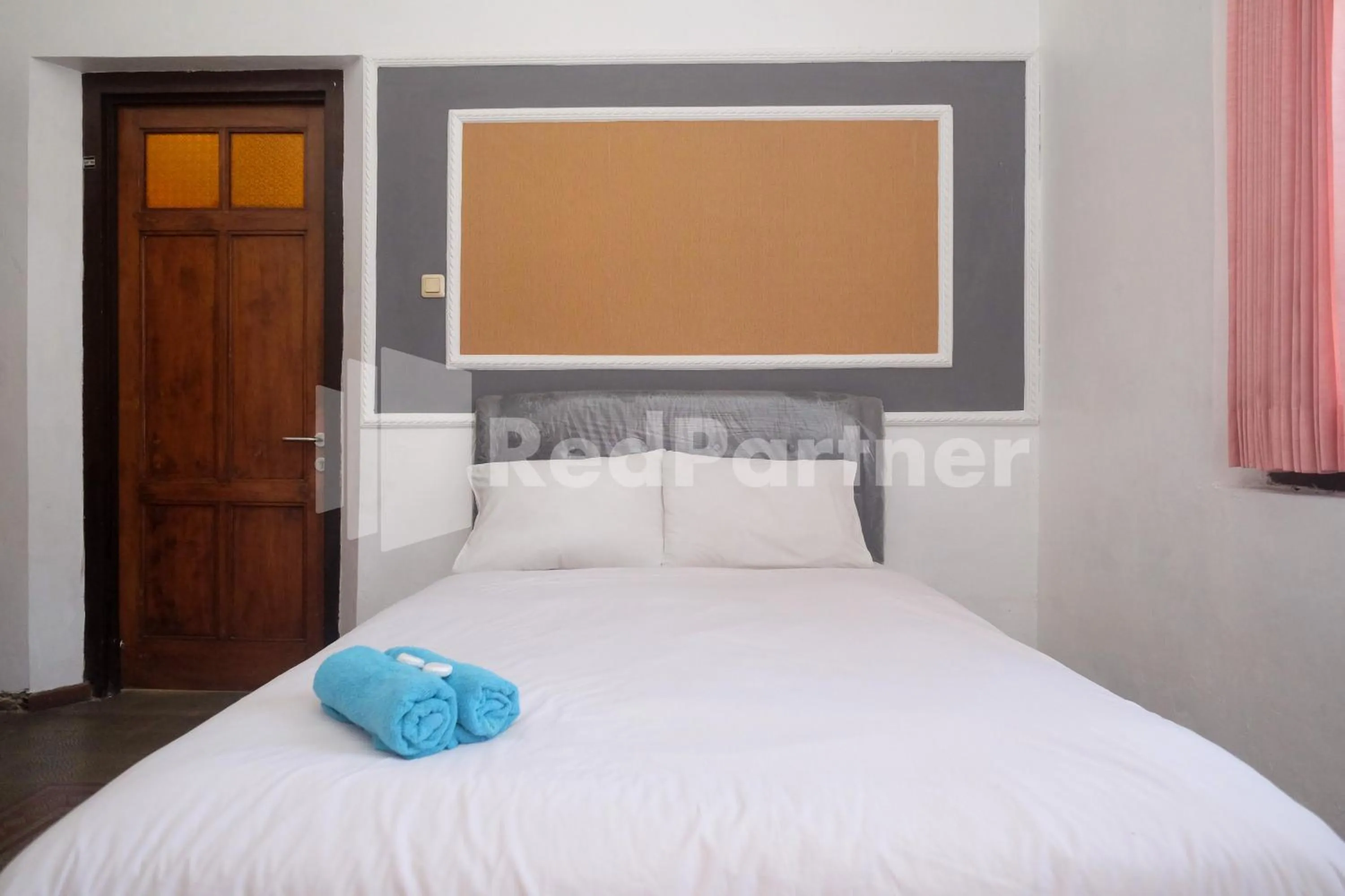 Bed in Hotel Limaran 1 Syariah Malioboro Mitra RedDoorz