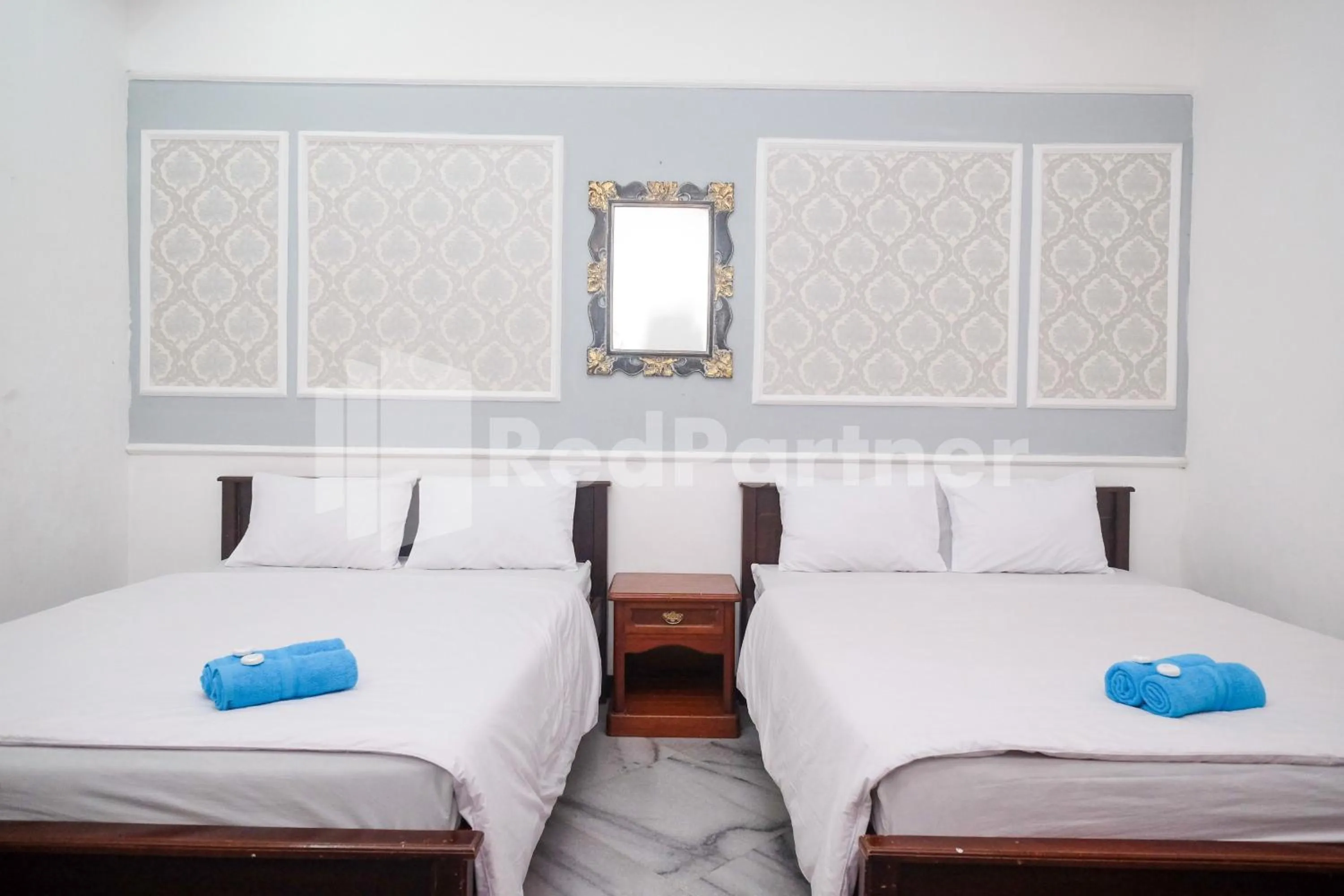Bed in Hotel Limaran 1 Syariah Malioboro Mitra RedDoorz