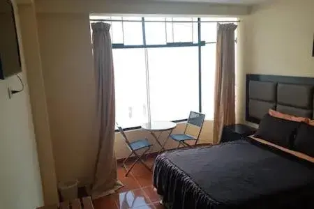 Double Room with Mountain View - single occupancy in Hostal Huacachina Sunset Double Room with Mountain View - single occupancy in Hostal Huacachina Sunset