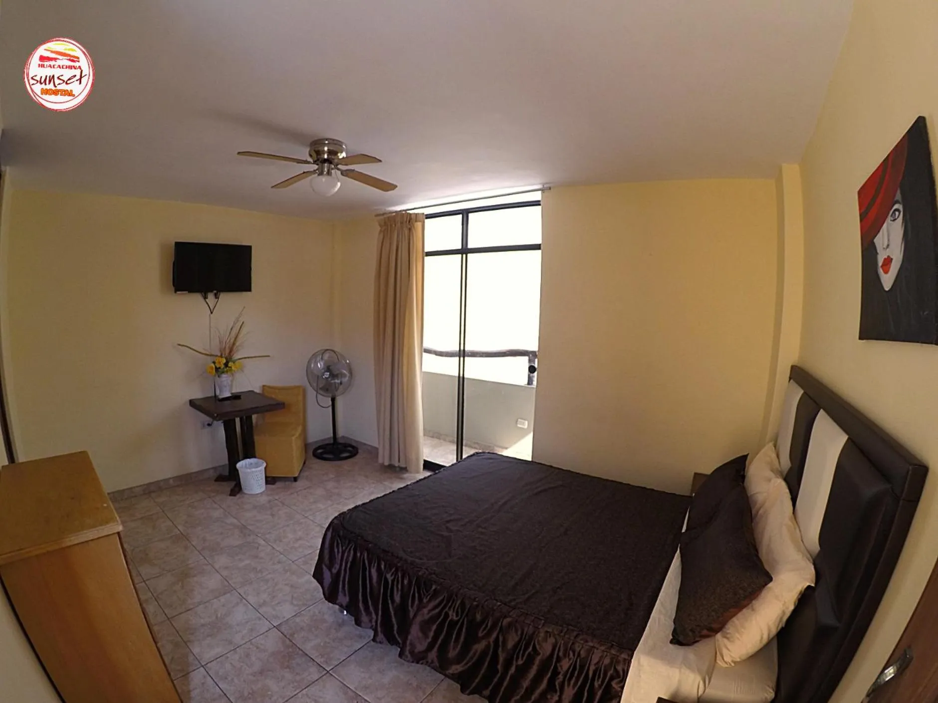 Photo of the whole room, Bed in Hostal Huacachina Sunset