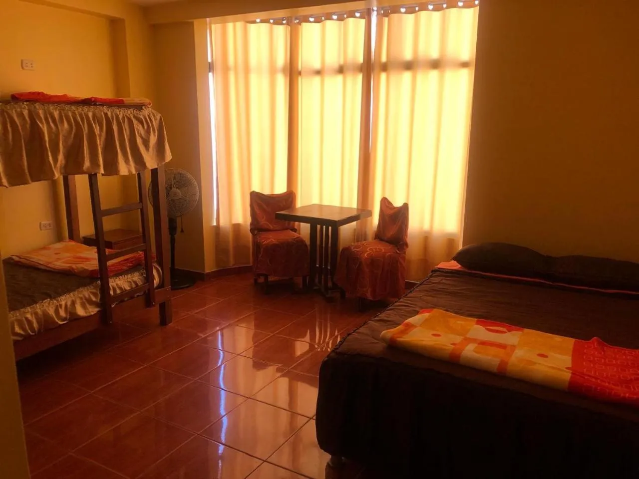 Bed in Hostal Huacachina Sunset