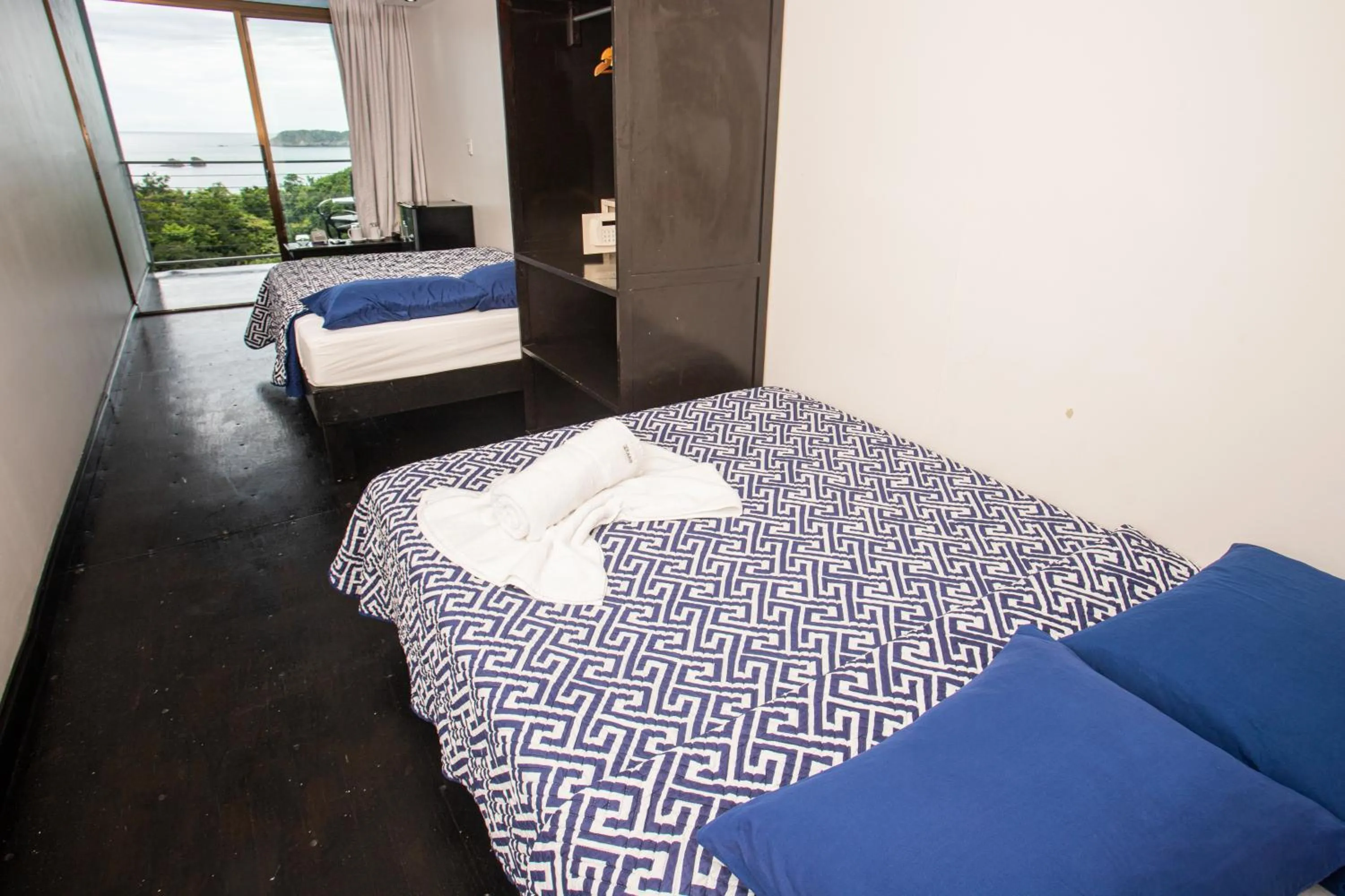 Photo of the whole room, Bed in El Faro Containers Beach Hotel